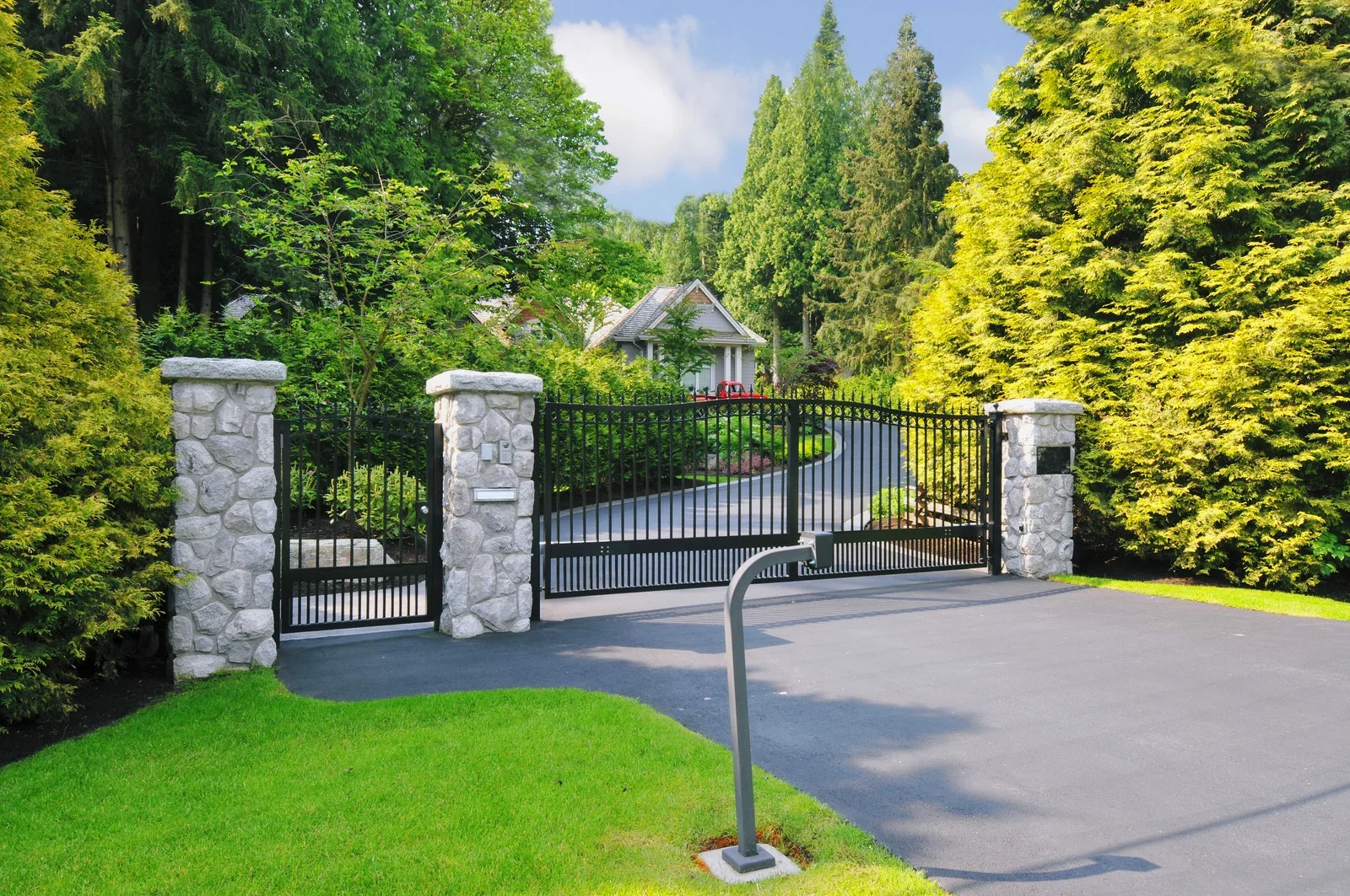 rustic wooden single driveway gate open at entrance