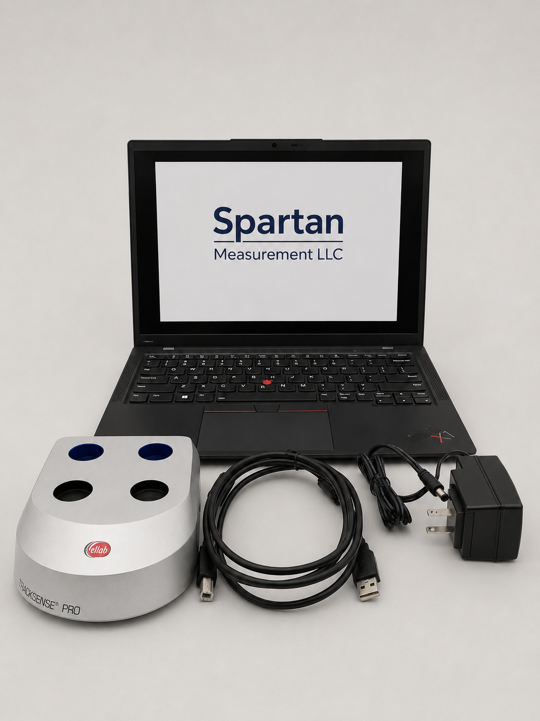 Validation equipment rental kit with laptop, TrackSense Pro reader, cables, and power adapter.