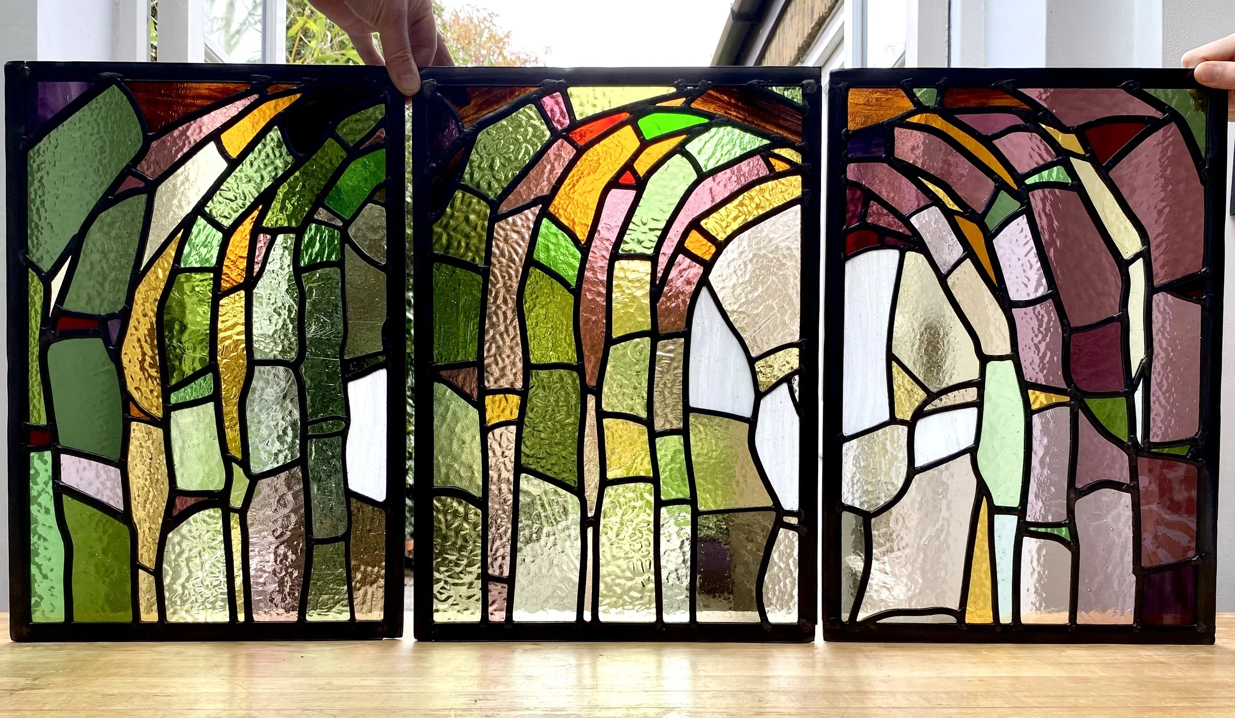 three stained glass panels of abstract design.  Zoe Henderson South East London