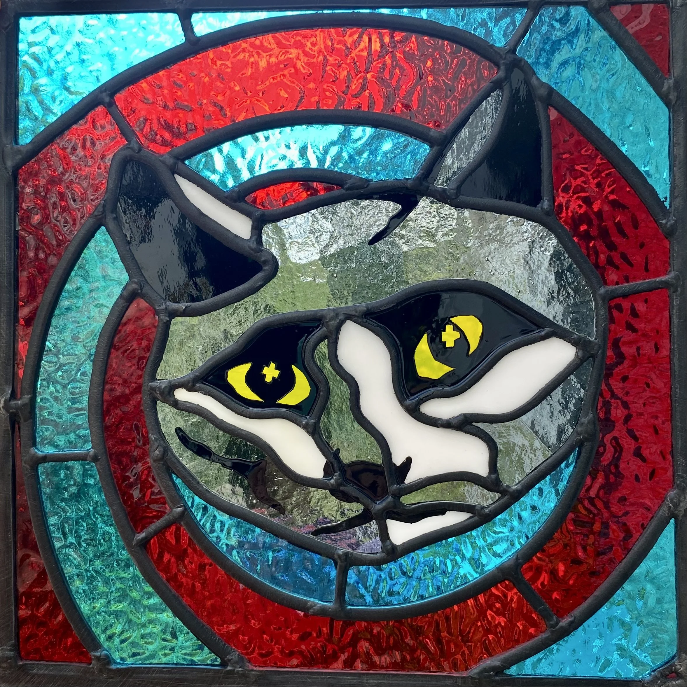 zoe henderson stained glass business logo.