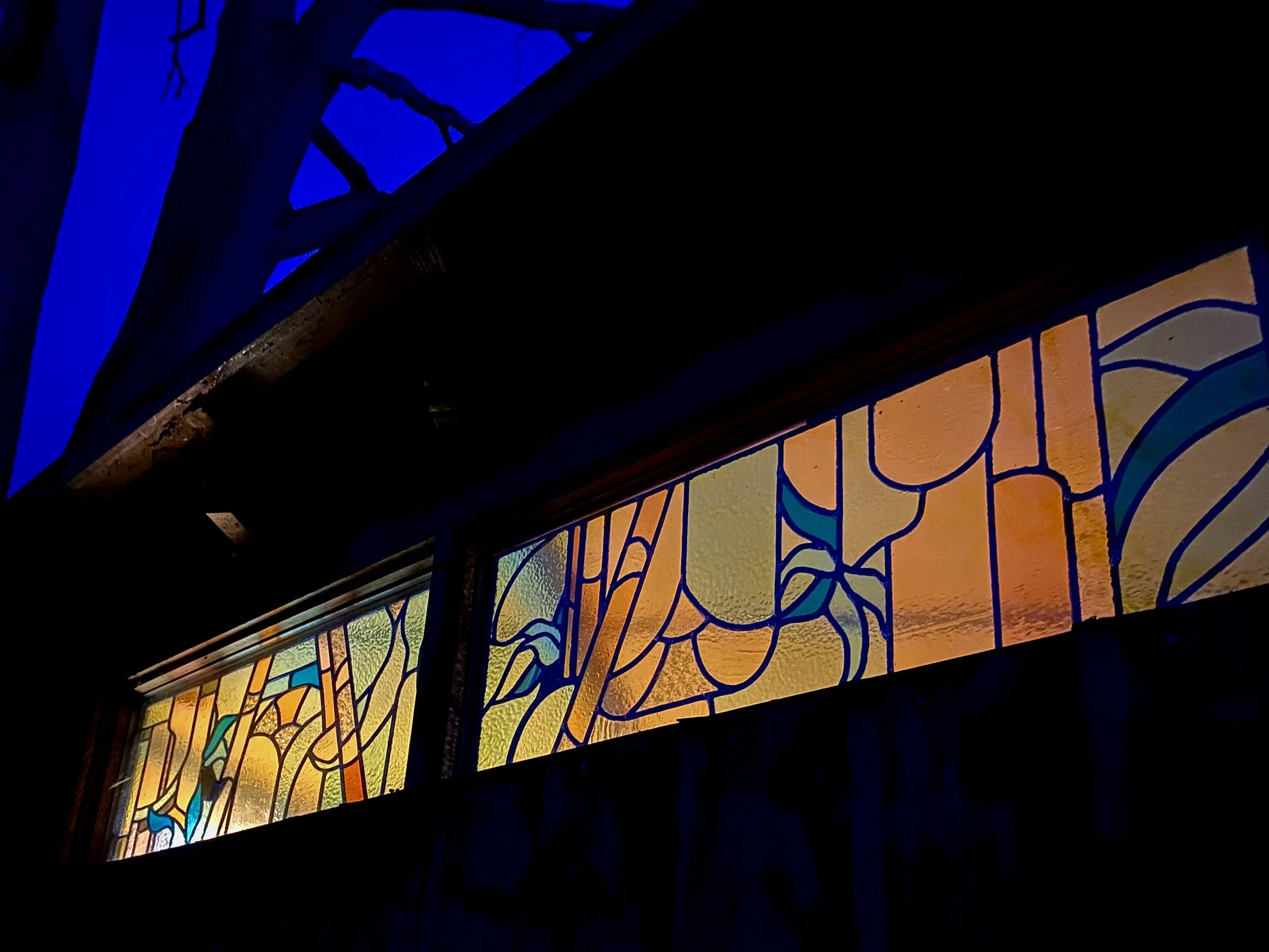 stained glass by zoe henderson at night in office garden room