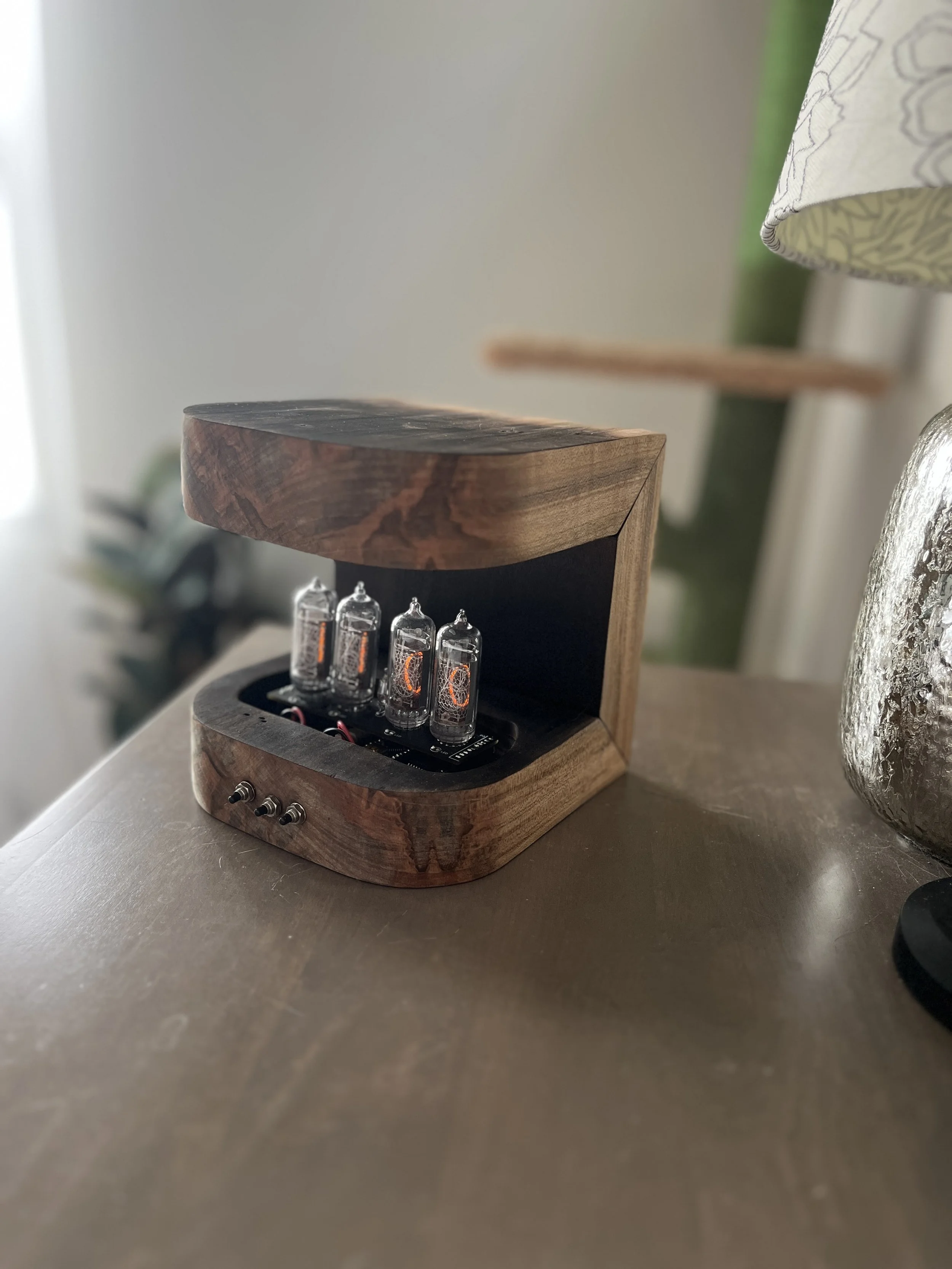 Nixie tube clock and charger