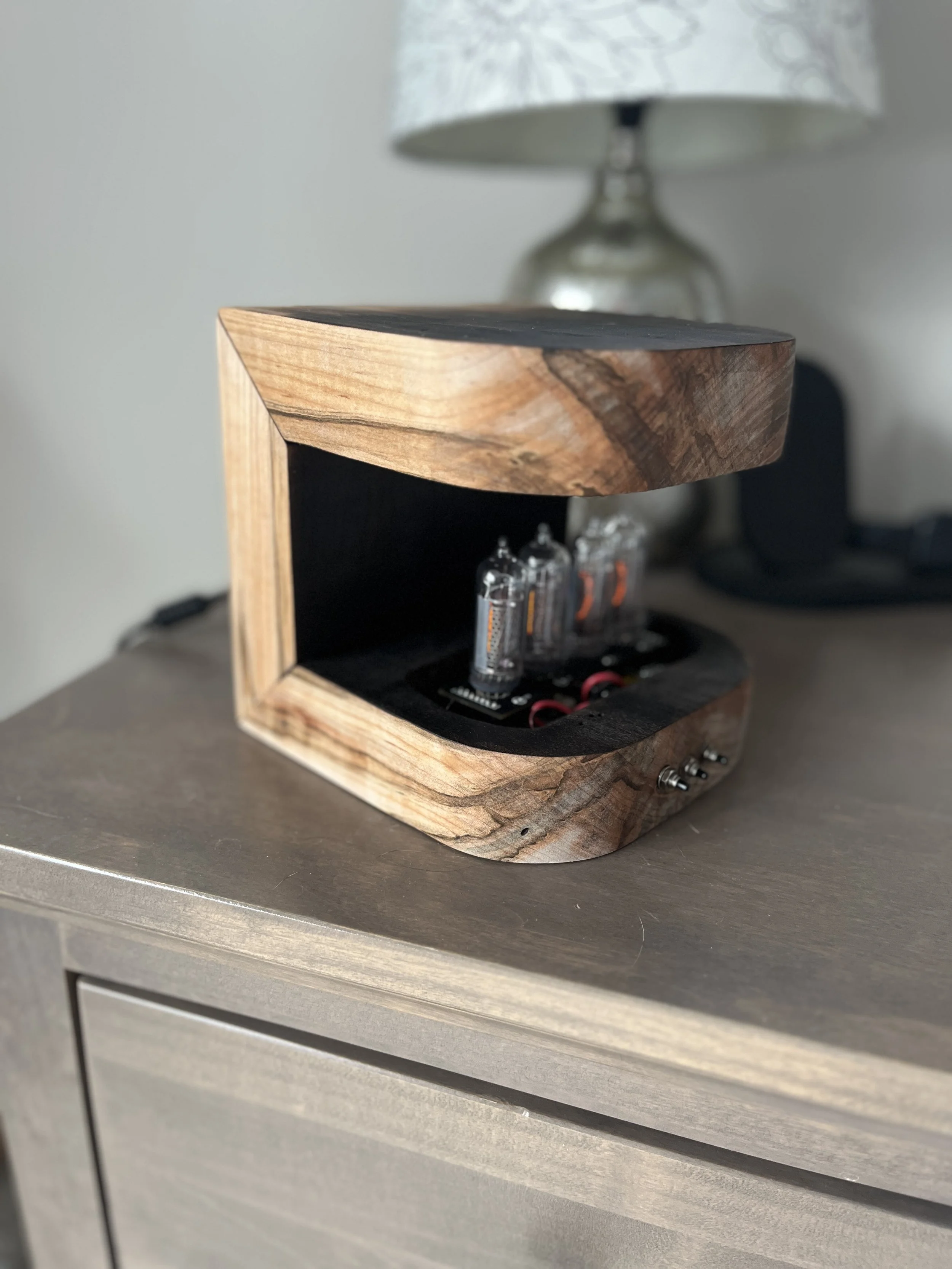 Nixie tube clock and charger