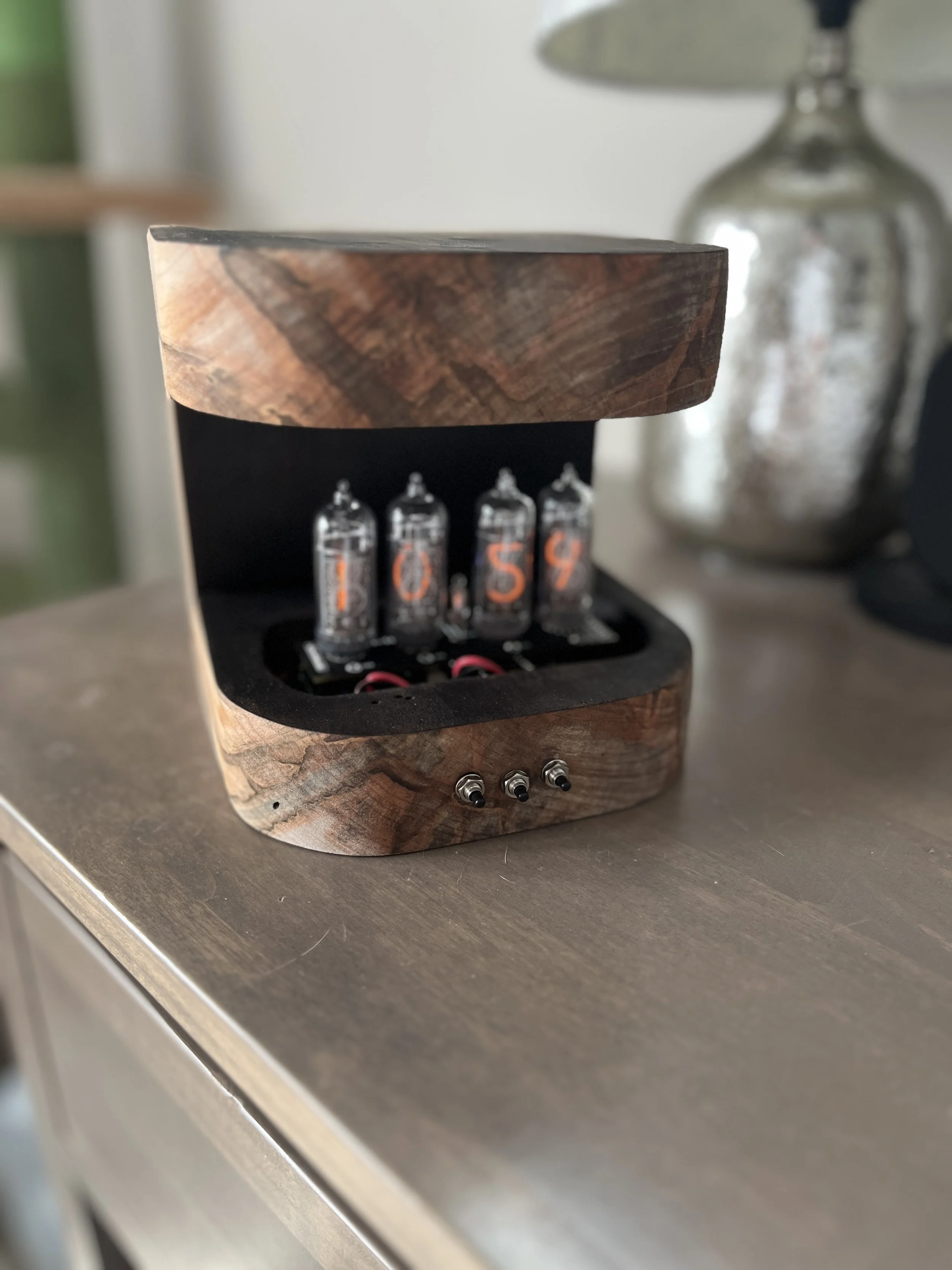 Nixie tube clock and charger
