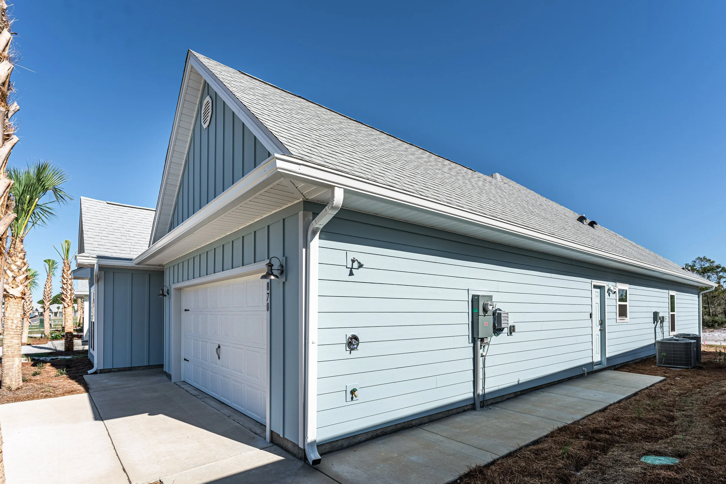 Garage + Outdoor Shower & Second Suite Exterior Entrance