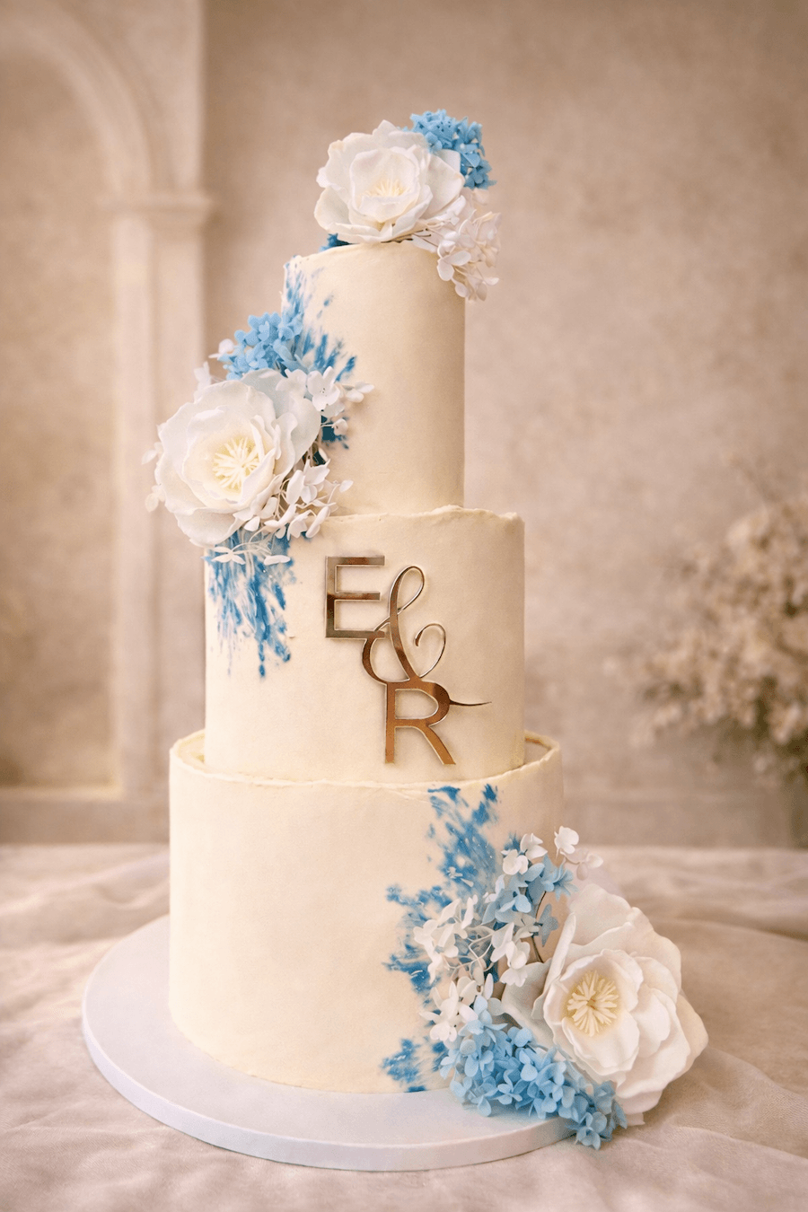 Monogram-Wedding-Cake-Blue-Floral-Kent.png