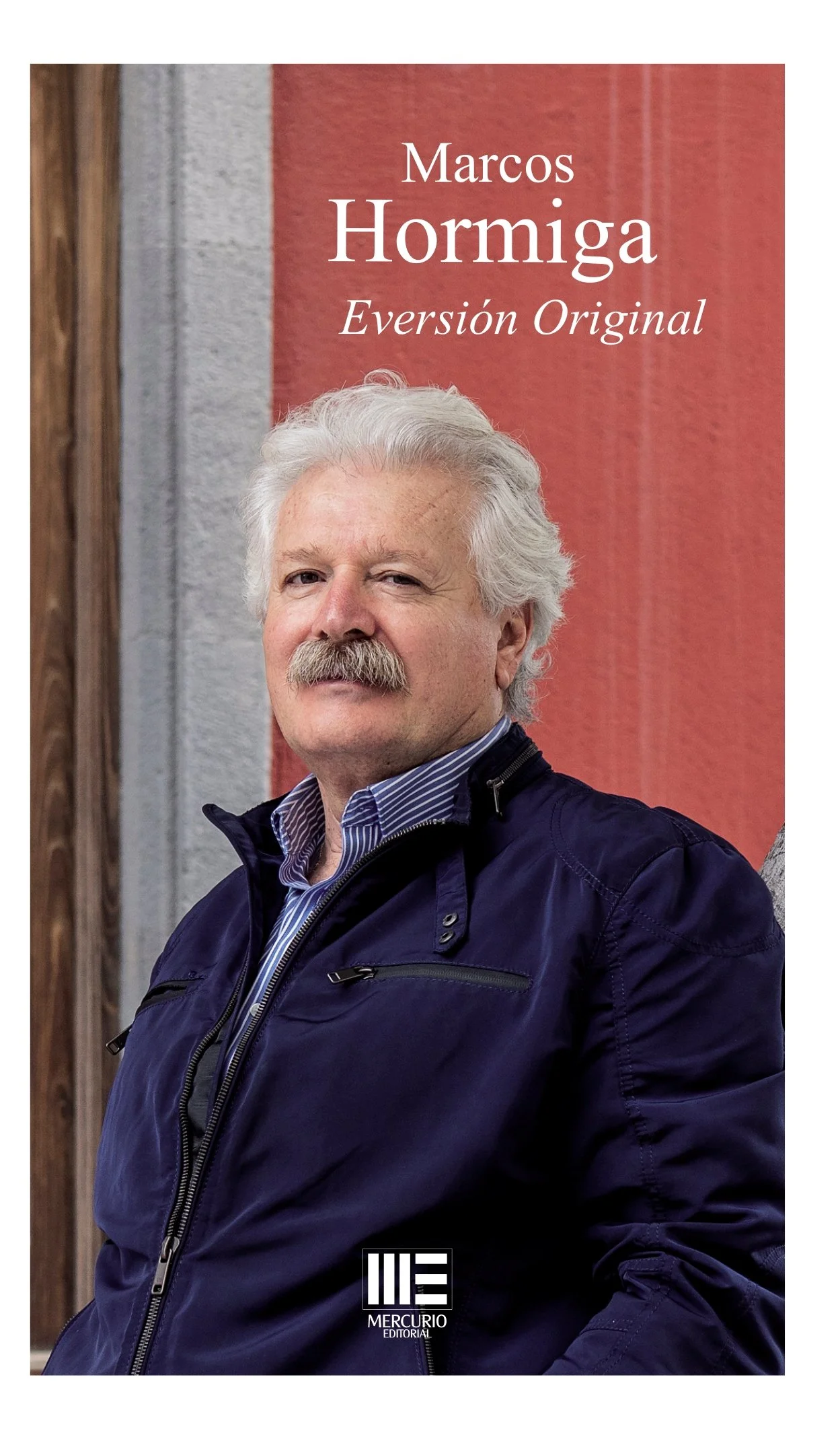 Portada del libro con la imagen de un hombre de cabello y bigote gris, usando chaqueta azul y camisa a rayas, en un fondo con paredes de colores y el logo de la editorial Mercurio.