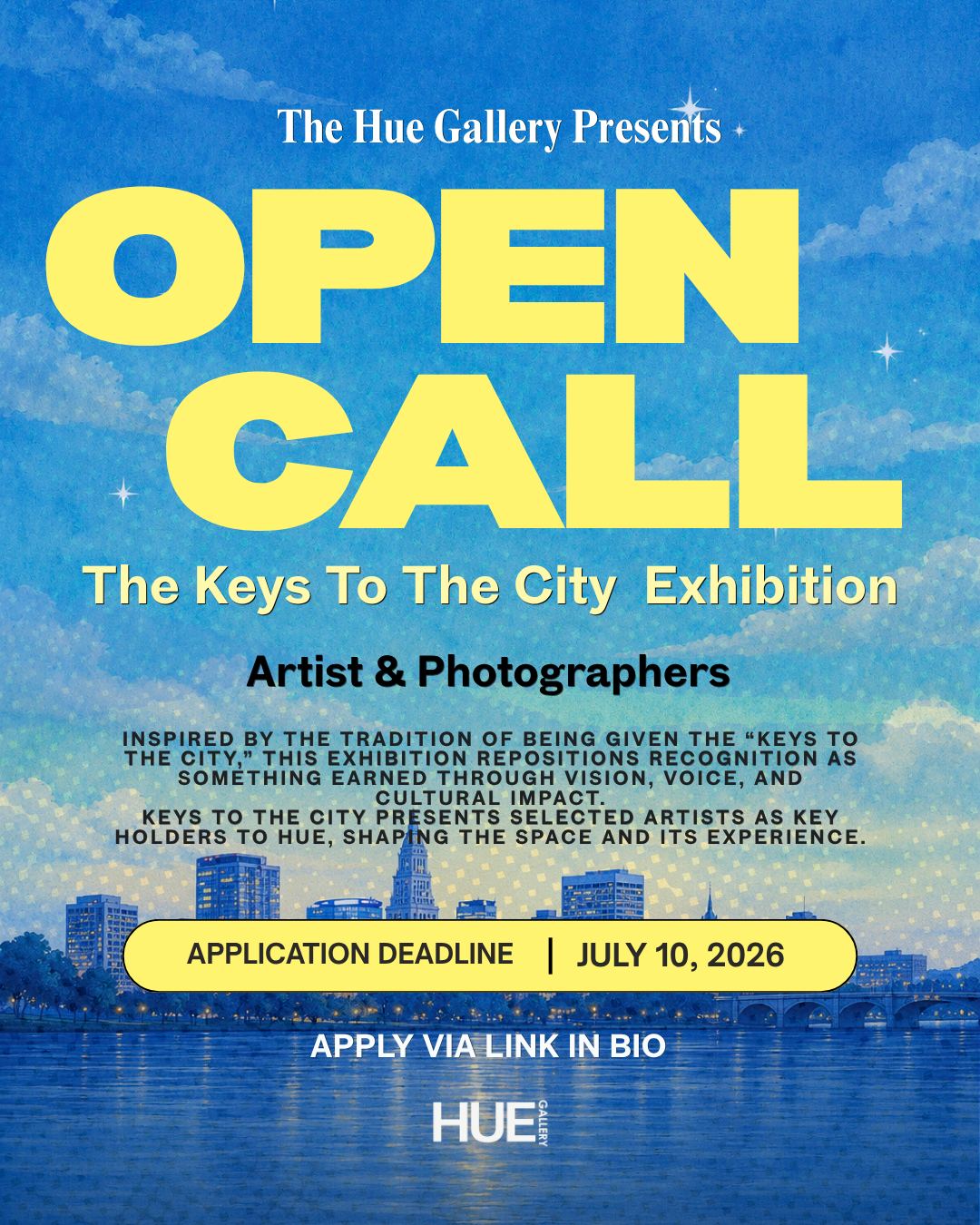 Poster for an art and photography exhibition called 'Open Call: The Keys To The City.' The background features a city skyline at dusk with a blue sky, clouds, and stars. The text details the exhibition's theme, application deadline, and instructions to apply via a link in bio.