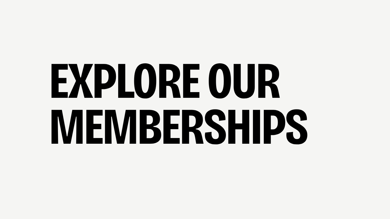 Text that says 'Explore Our Memberships'