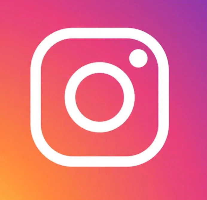 Instagram logo on a colorful gradient background.