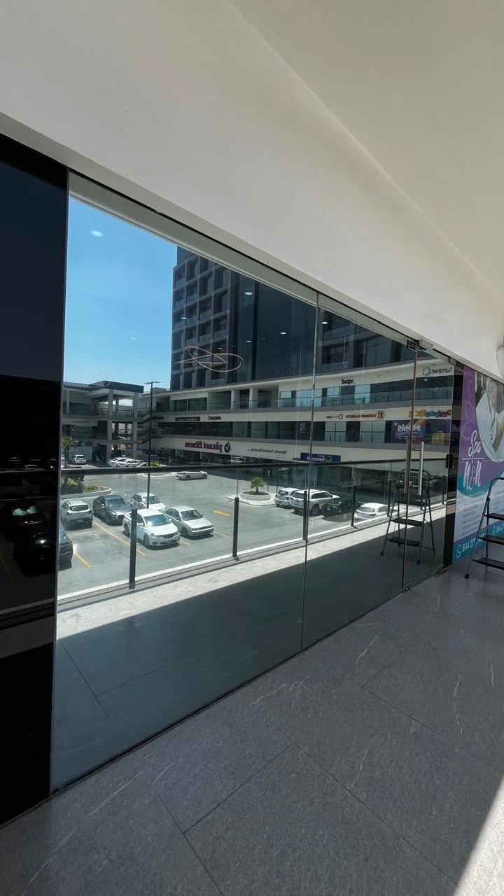 instalación polarizado ventana local comercial