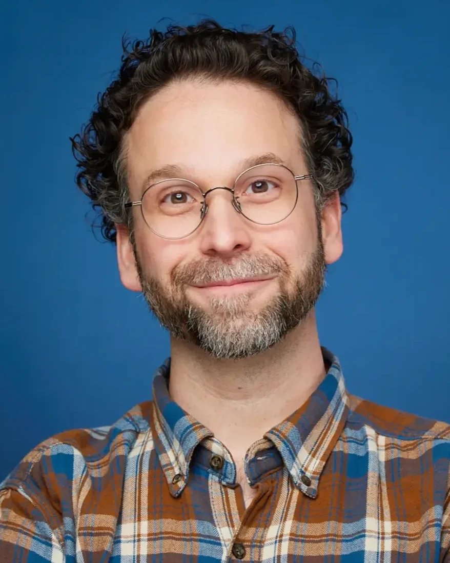 male actor with beard and glasses during his acting headshot session in Chicago