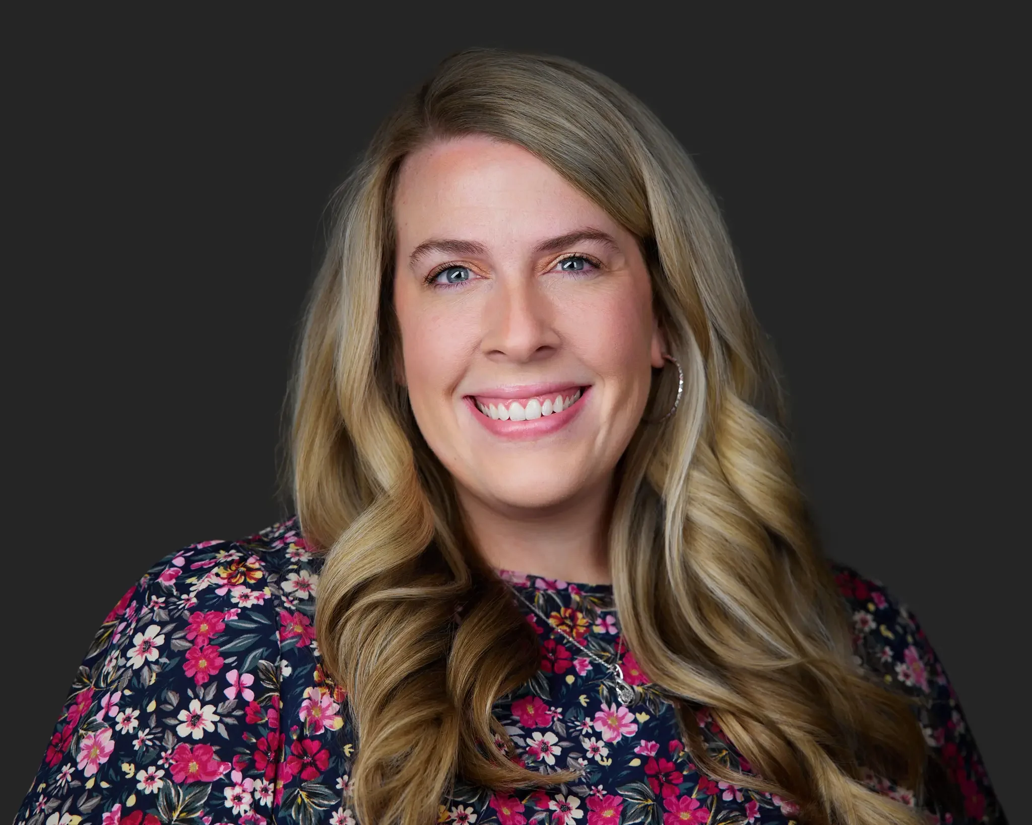 business portrait showing natural expression captured during a company retreat