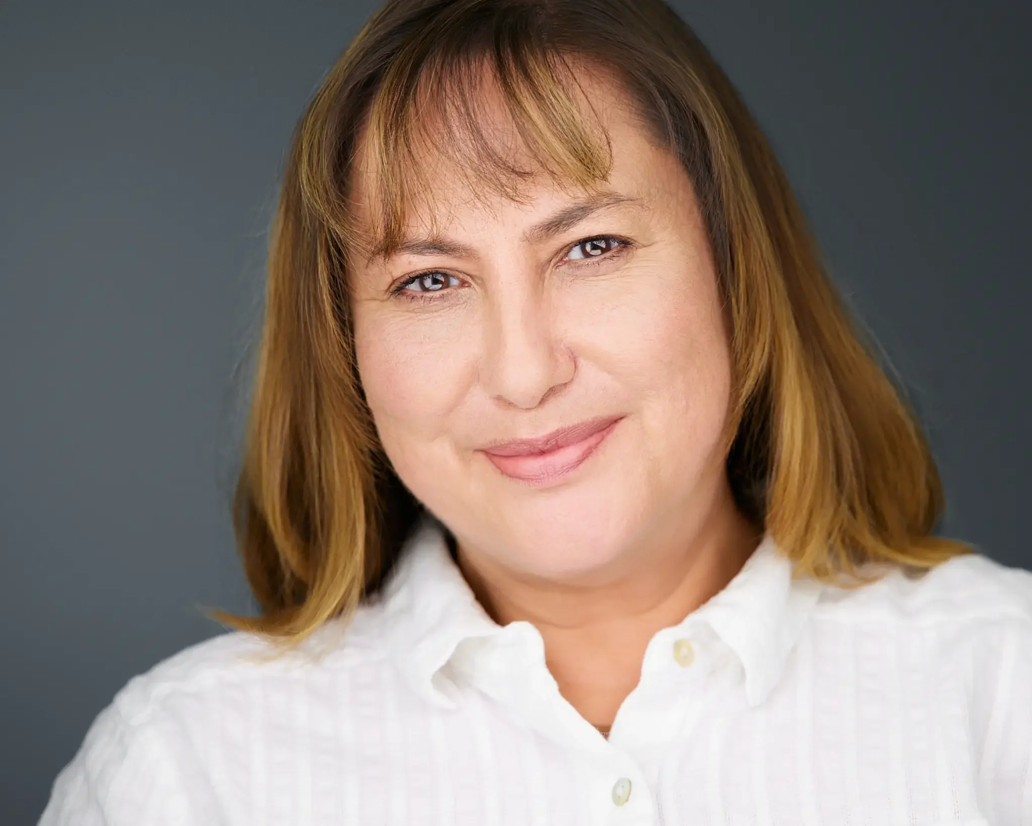 executive portrait with natural expression captured during guided studio headshot session in Chicago