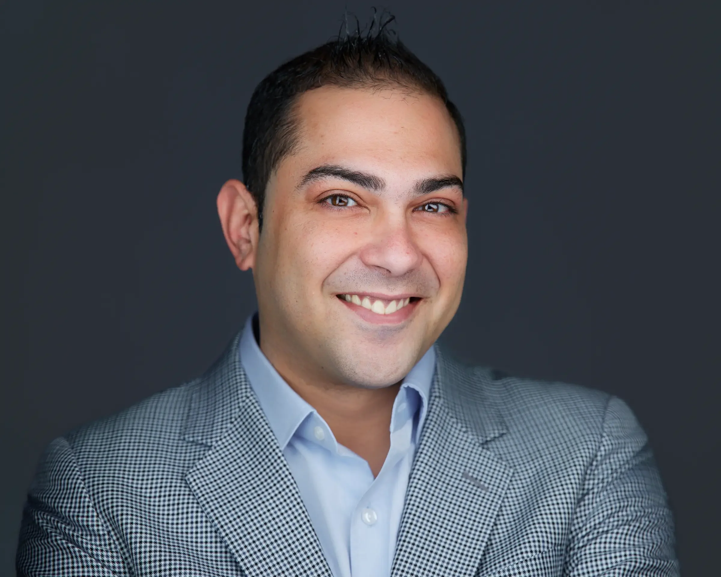 founder smiling during an on location headshot session in chicago