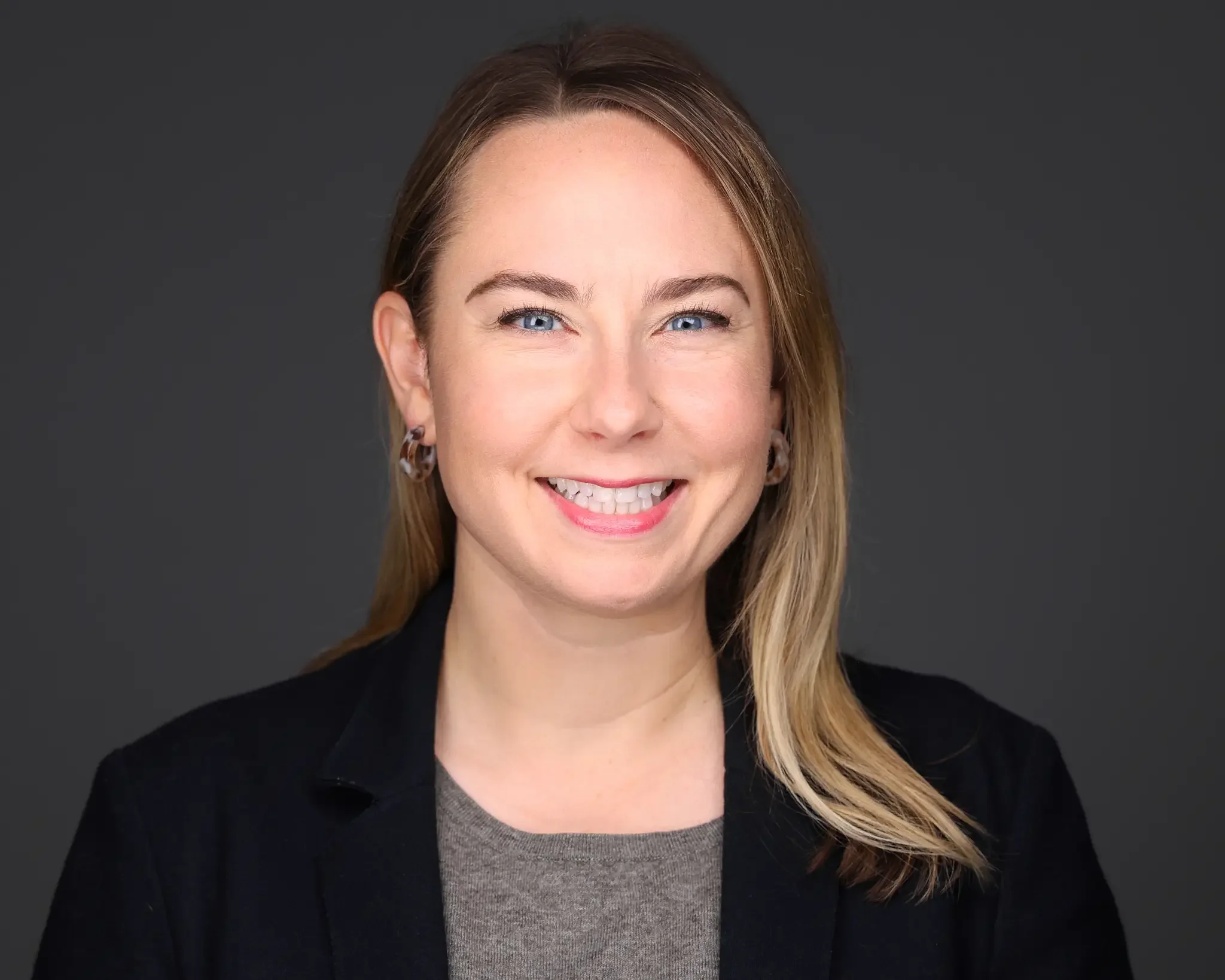 headshot of a women taking during a company kickoff in chicago