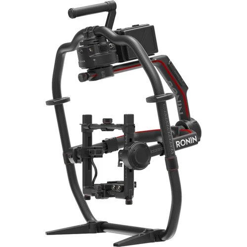 Ronin camera stabilization rig with handle, monitor, and support frame.