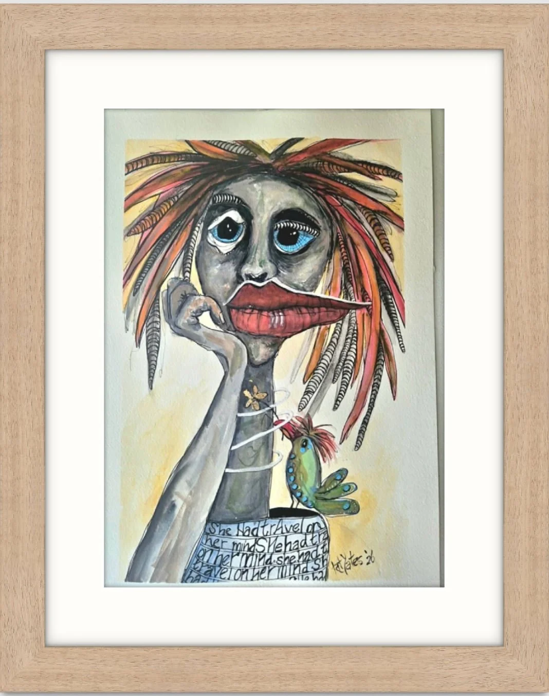 Travel on Her Mind, a framed original mixed-media portrait by Kathryn Yates featuring an expressive woman, a small bird and layered handwritten detail.