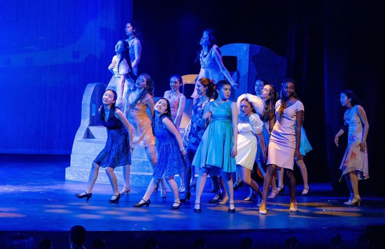 Performing in Mama Mia