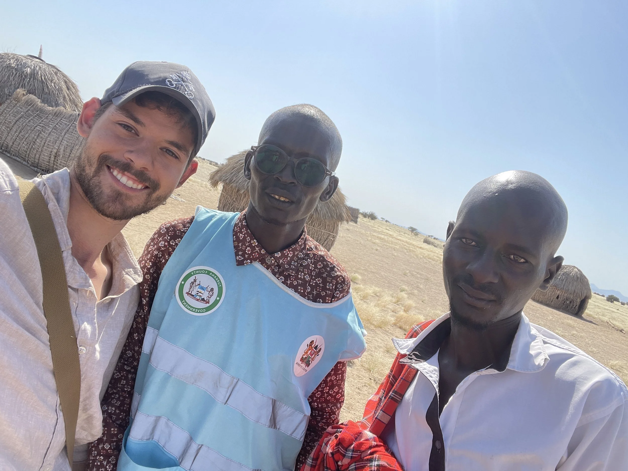 Dylan with Ng'ipalajem fieldworkers, Mzugut and James Lokwasinyen.