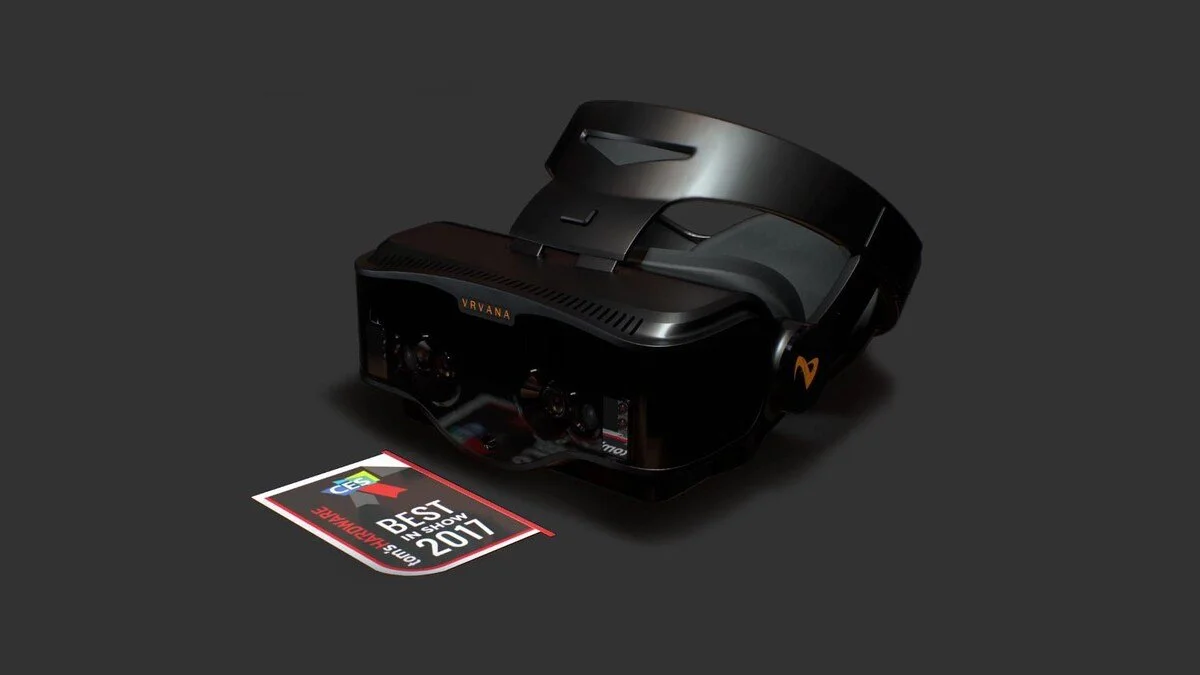 Vrvana Totem AR Headset placed on a dark surface with an award plaque that reads "Best in Show, CES 2017" in front of it.