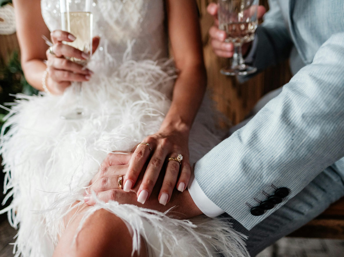 bride and groom with champagne
