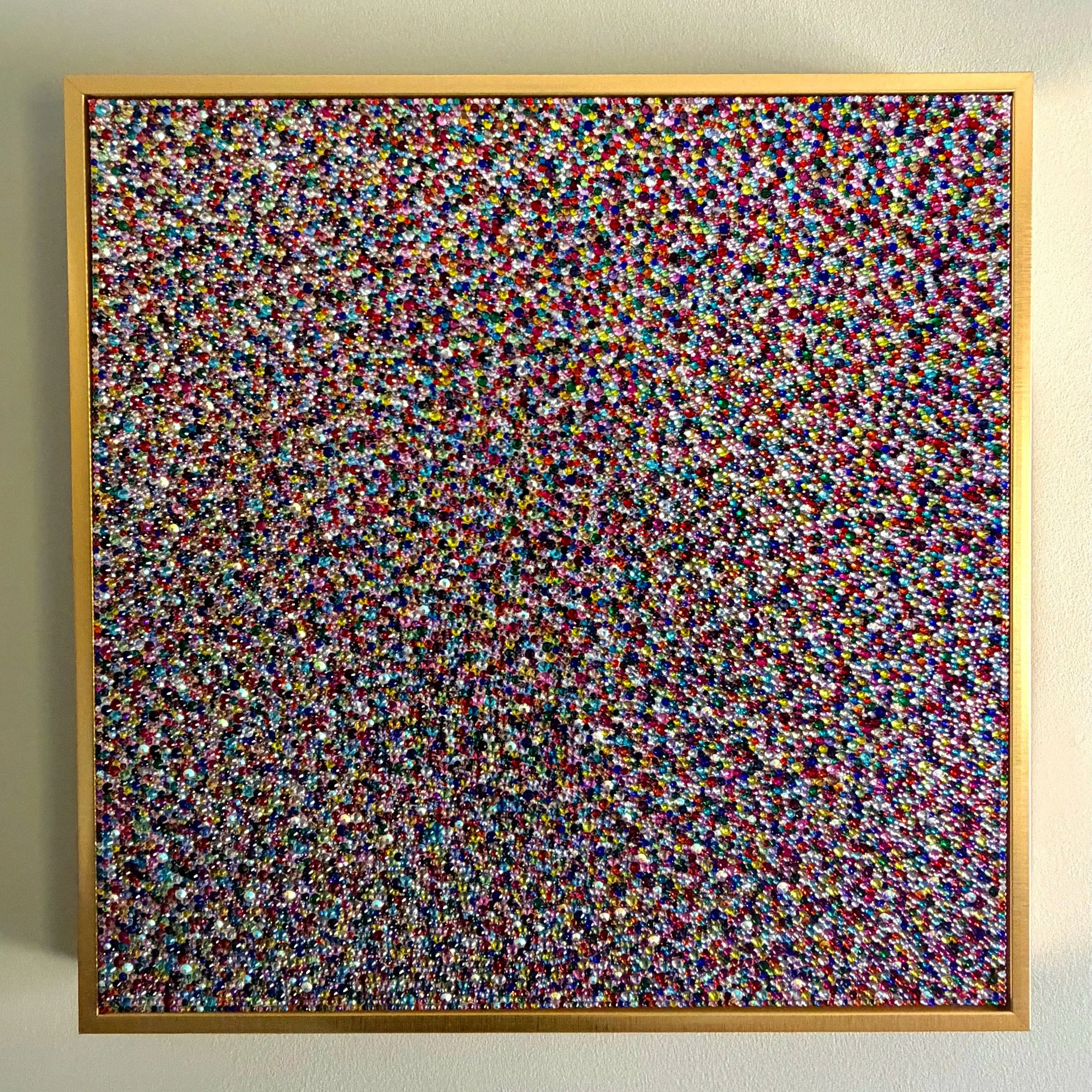 Panic, 2026. 20 x 20 in. A dense, vibrating field of multicolored glass rhinestones creating a shimmering, high-energy texture.