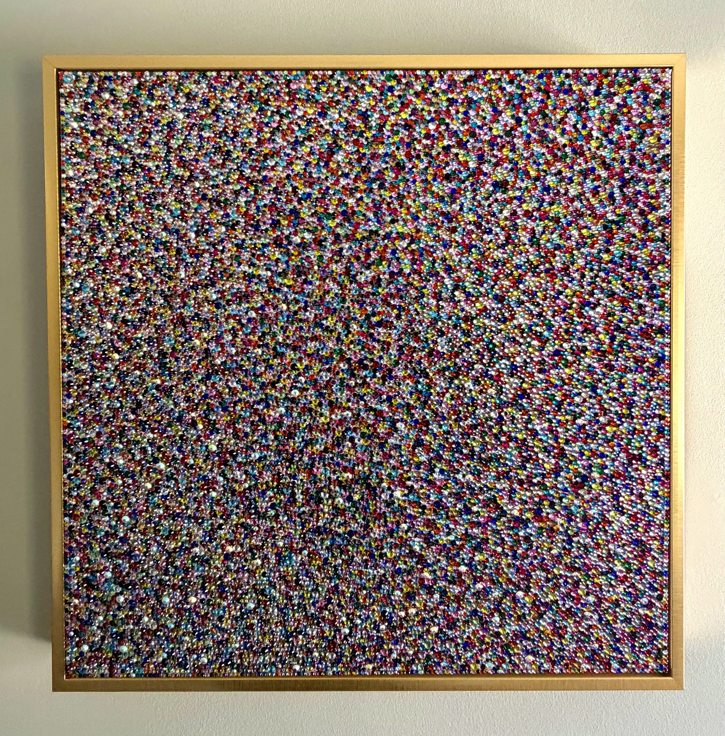 Panic, 2026. 20x20 in. Multicolored sculptural panel in a gold frame. A dense, vibrating field of over 10,000+ hand-placed rainbow glass rhinestones.