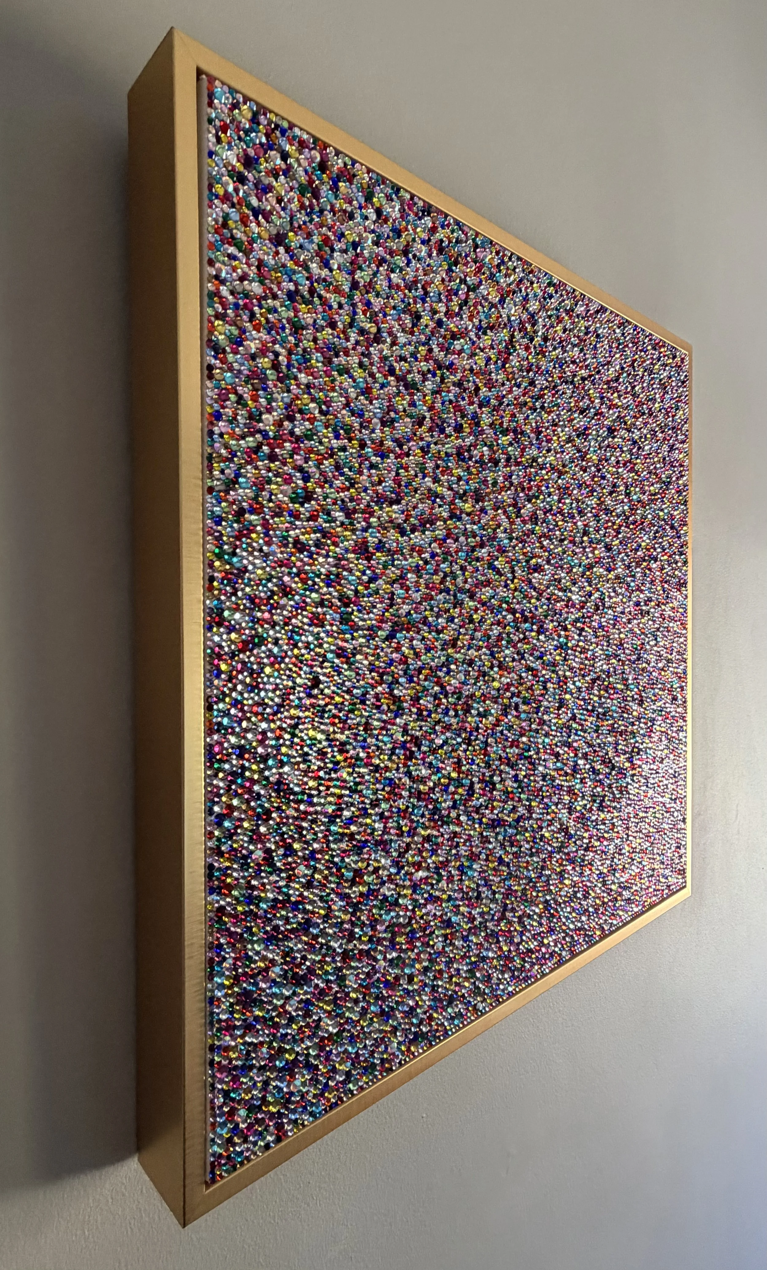 Panic (2026). Angled view showing the 3D depth of hand-placed rhinestones and the gold floating frame for a sculptural, textured profile.