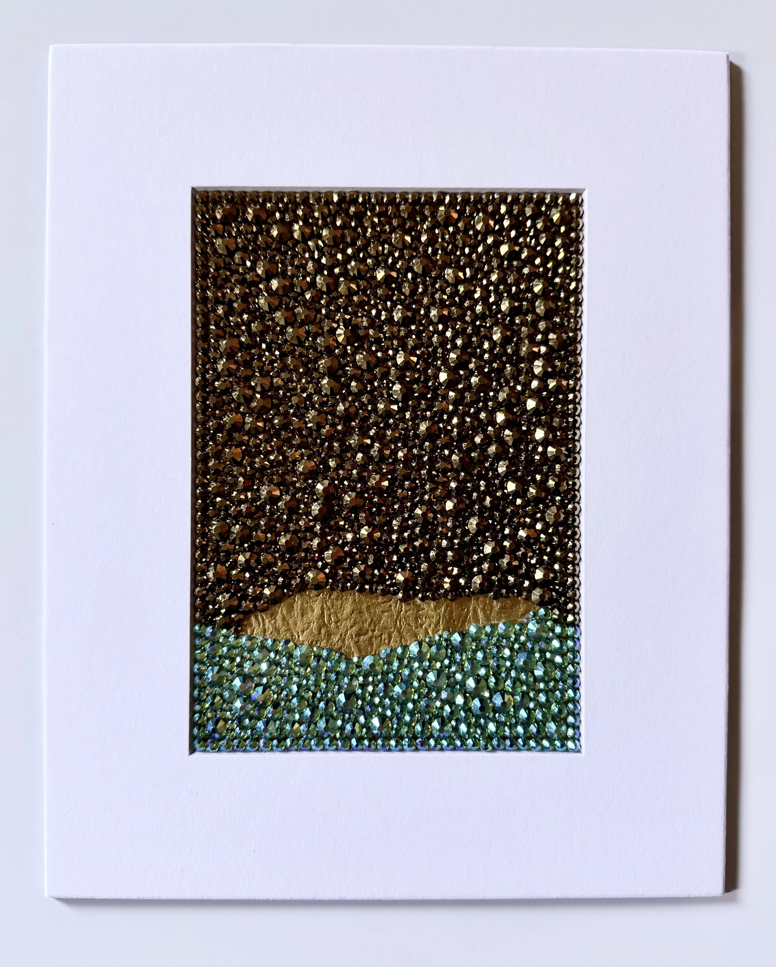 A matted 5x7-inch original rhinestone artwork on origami paper titled "Corrosion" within an 8x10-inch white mat.