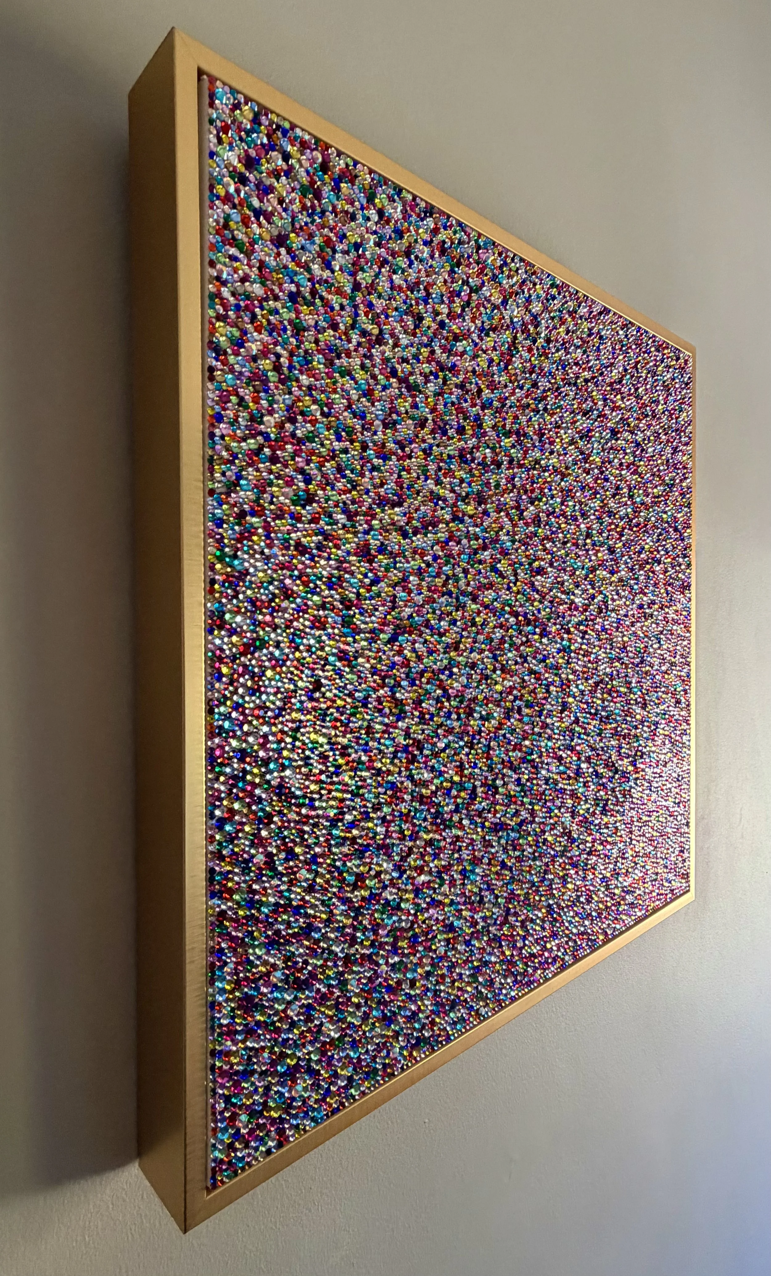 Panic (2026). Angled view showing the 3D depth of hand-placed rhinestones and the gold floating frame for a sculptural, textured profile.