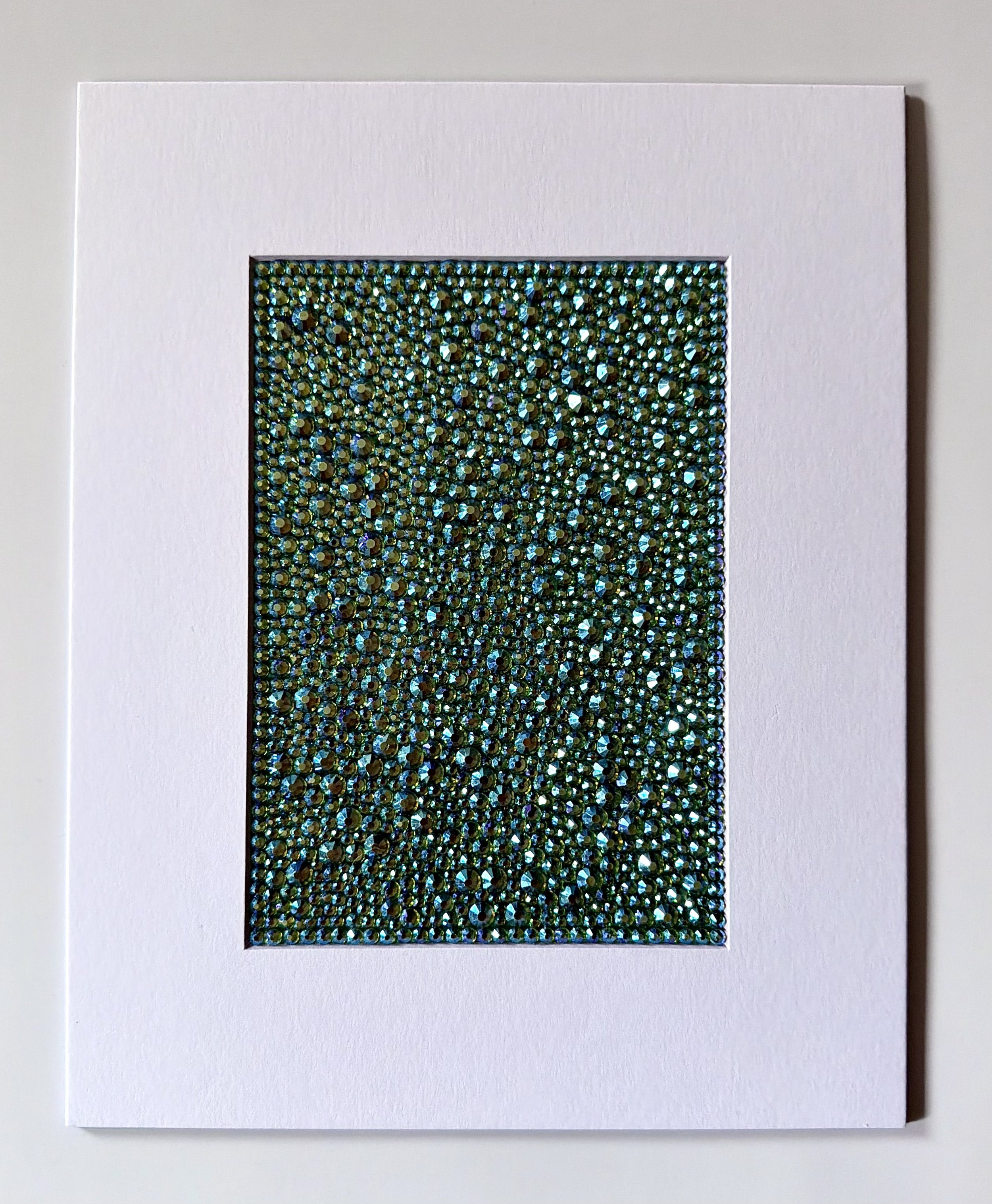 A matted 5x7-inch original rhinestone artwork on watercolor paper titled "Vacant" within an 8x10-inch white mat.