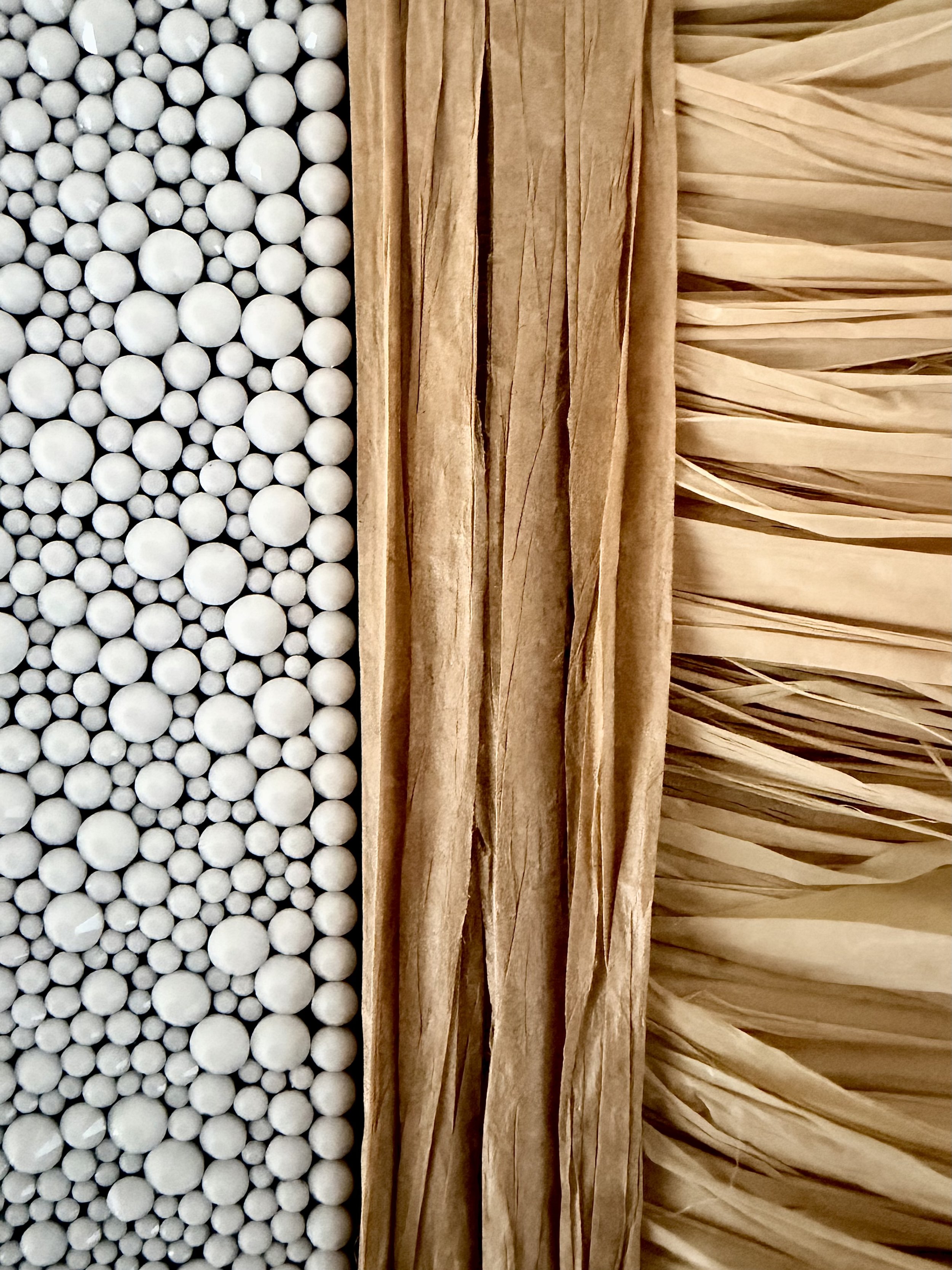 A macro close-up of the "Anxiety" art piece, showcasing multi-sized white rhinestones and textured natural raffia.