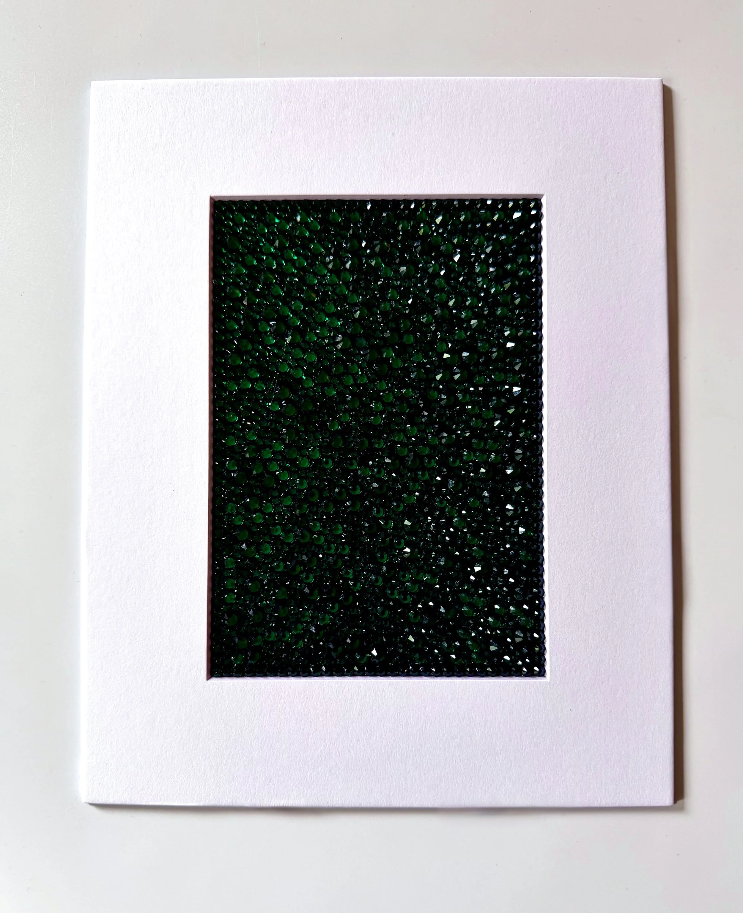 A matted 5x7-inch original rhinestone artwork on watercolor paper titled "Covet" within an 8x10-inch white mat.