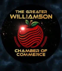 Logo for the Greater Williamson Chamber of Commerce featuring a stylized red apple with a green leaf and a black background with stars.