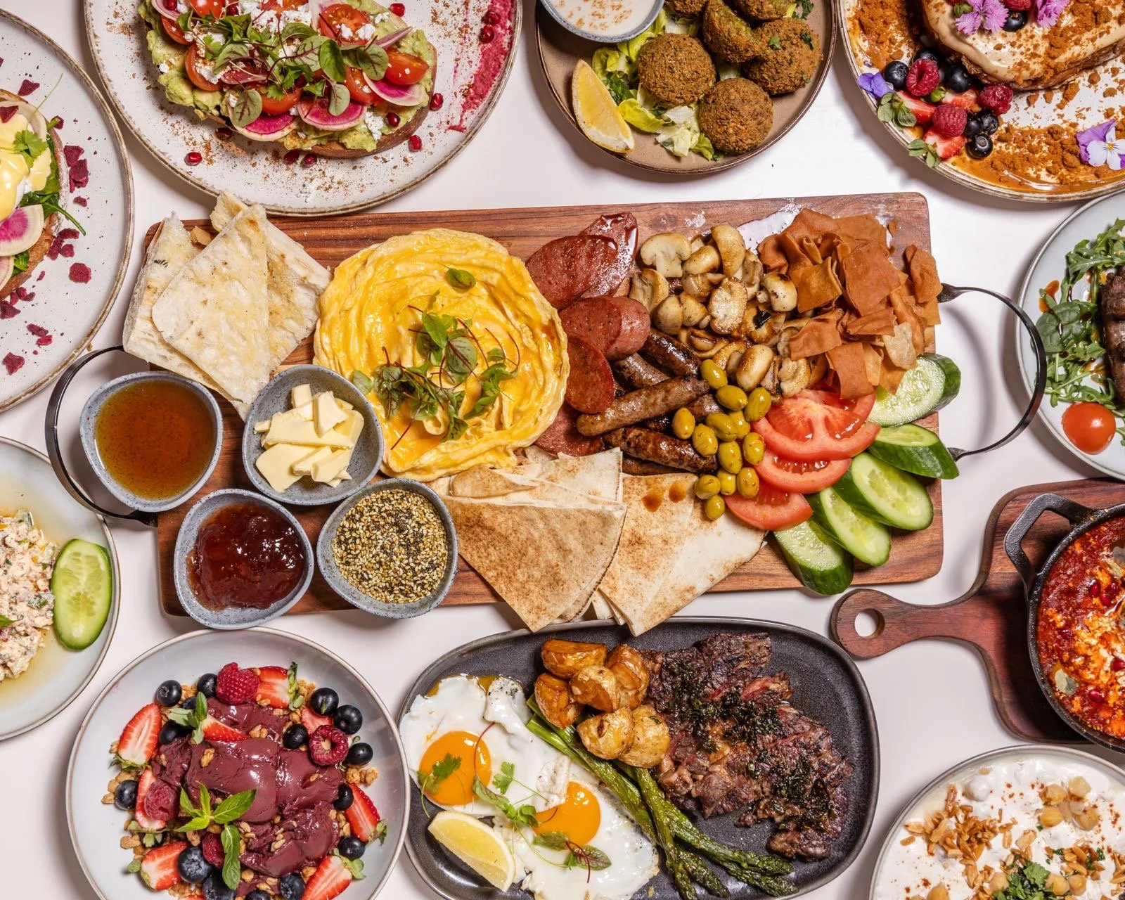 Breakfast dish options including steak, eggs, açai, breakfast platter and more.