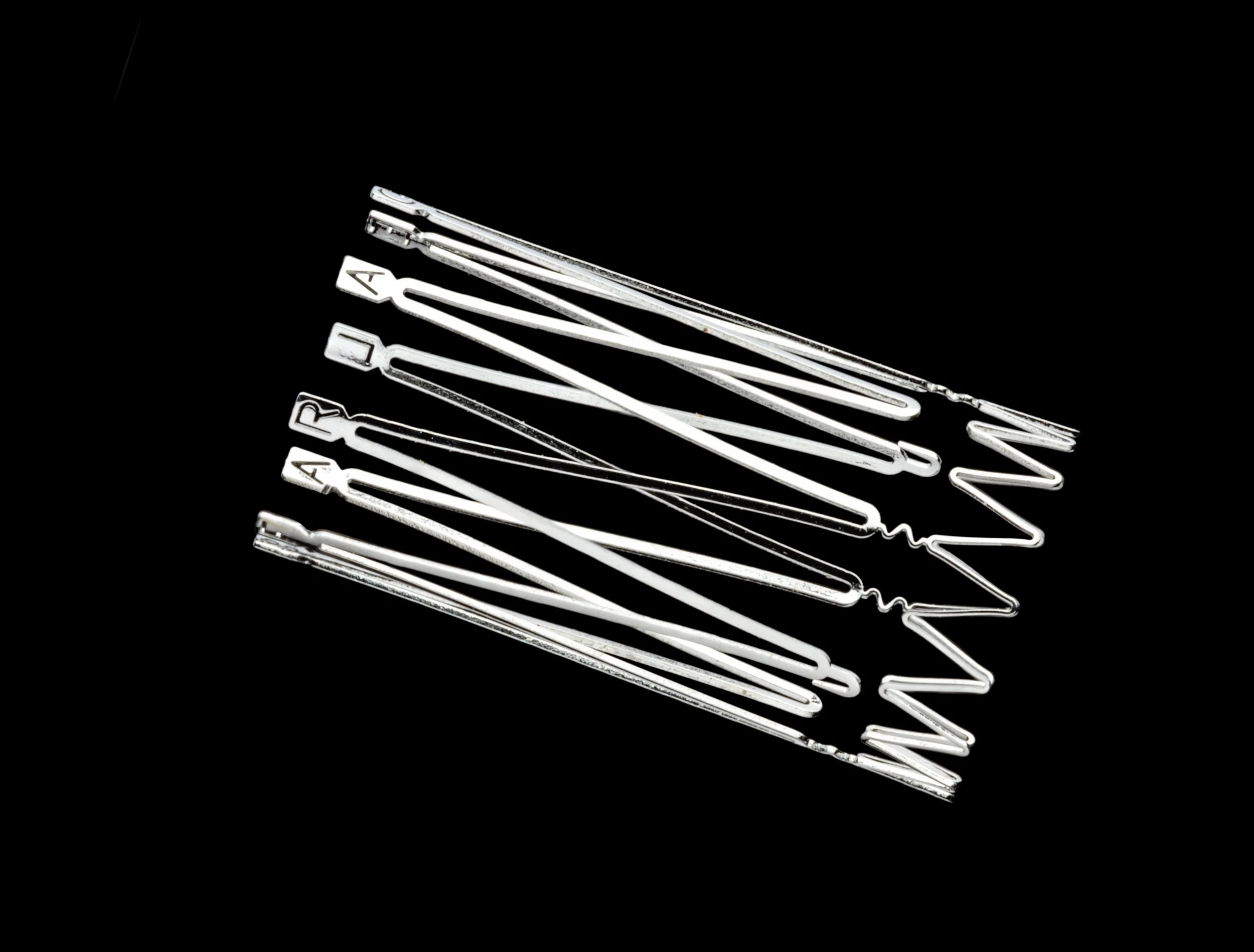 Made from a lightweight metal alloy called nitinol. It has been shape-set, which means the metal ‘remembers’ its shape when expanded. The compressed stent is small enough to be inserted in the artery via a tube. When in position, it expands to the se