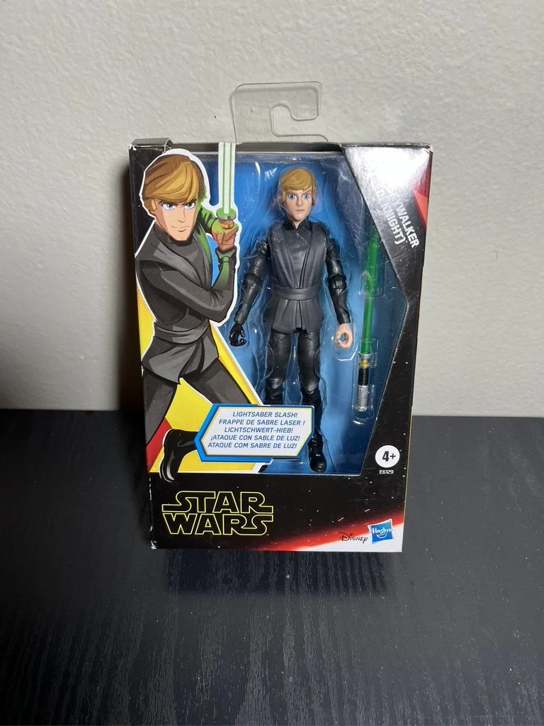 Star Wars Luke Skywalker Action Figure with Lightsaber Slash