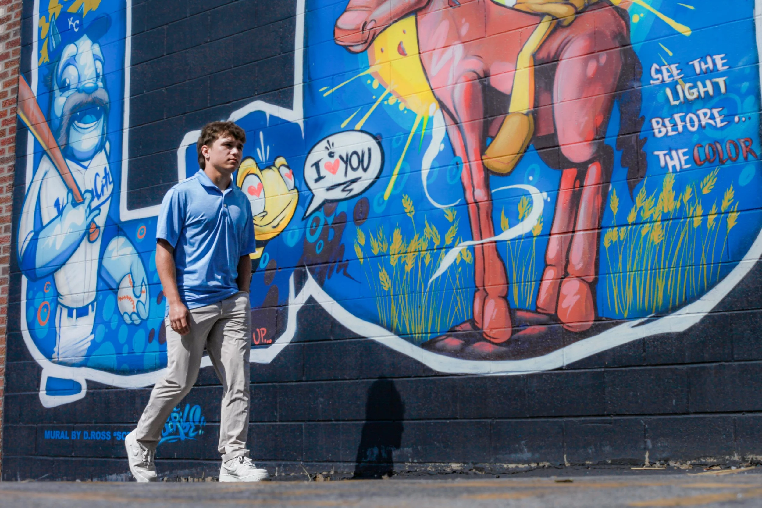 boy-senior-photo-kansas-city-mural-art-blue-baseball