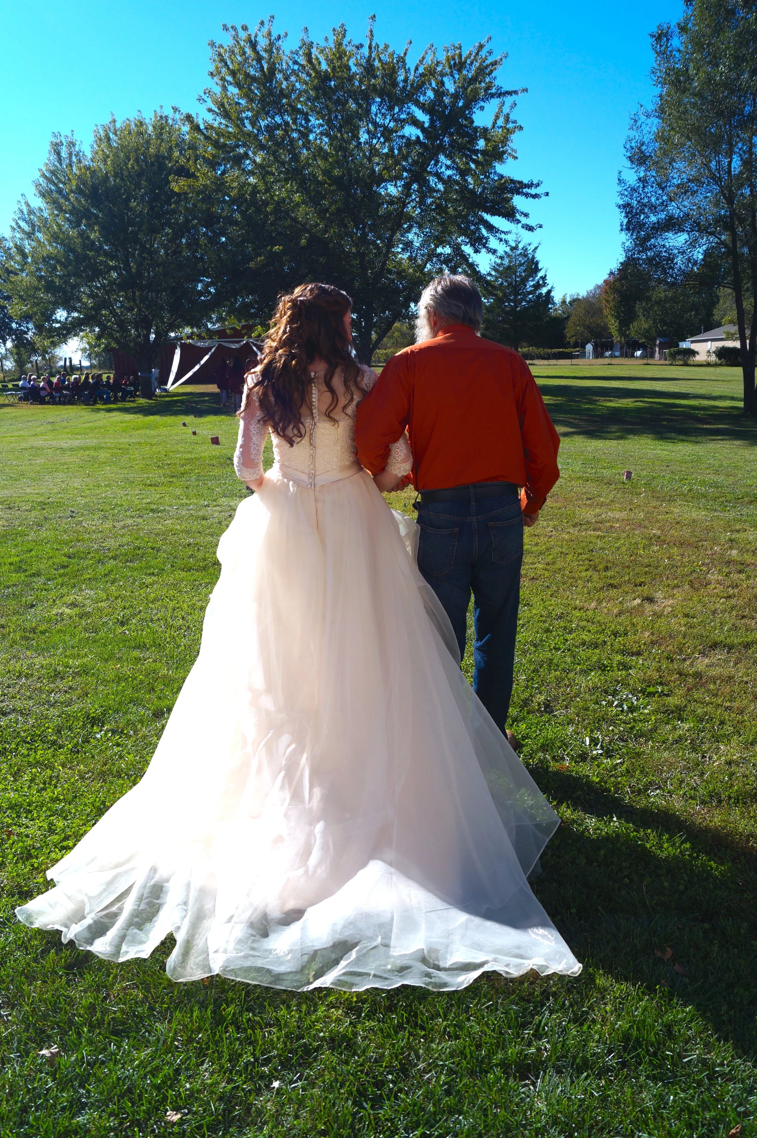 bride-father-of-bride-orange-aisle-walking-wedding
