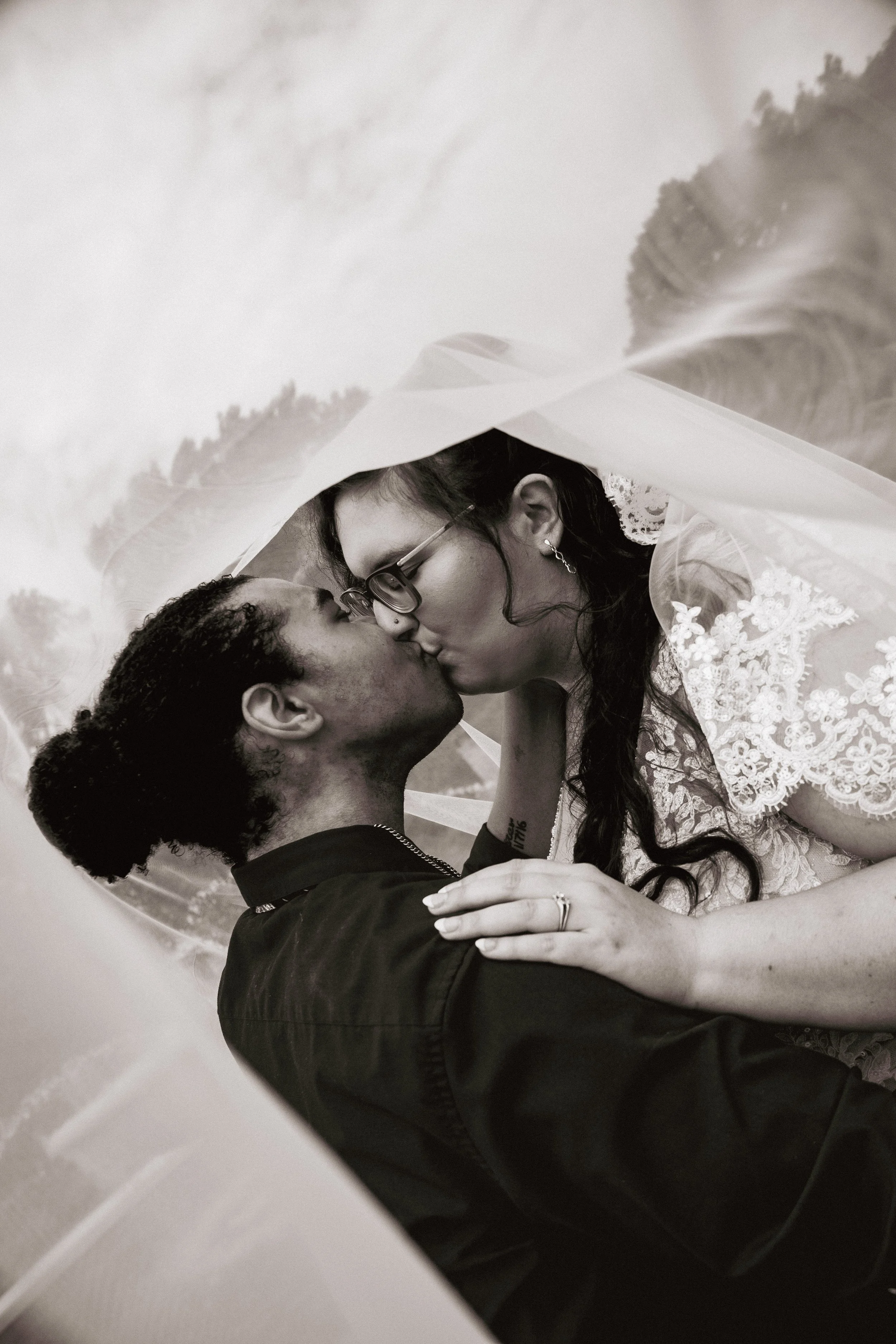 wedding-bride-groom-rose-garden-kansas-city-happy-couple-sweet-wedding-dress-gown-veil-kiss