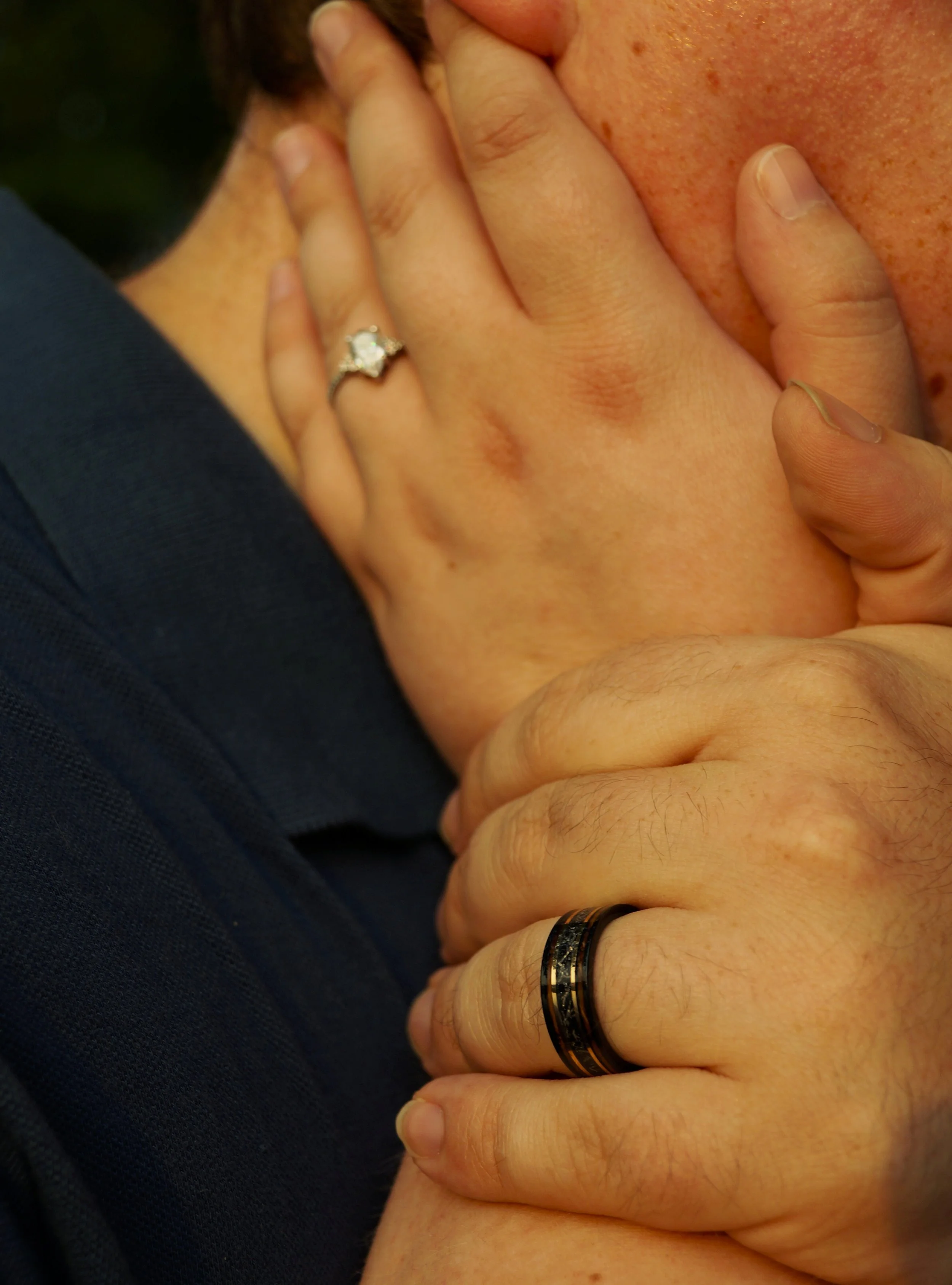engagement-rings-holding-hands-caress