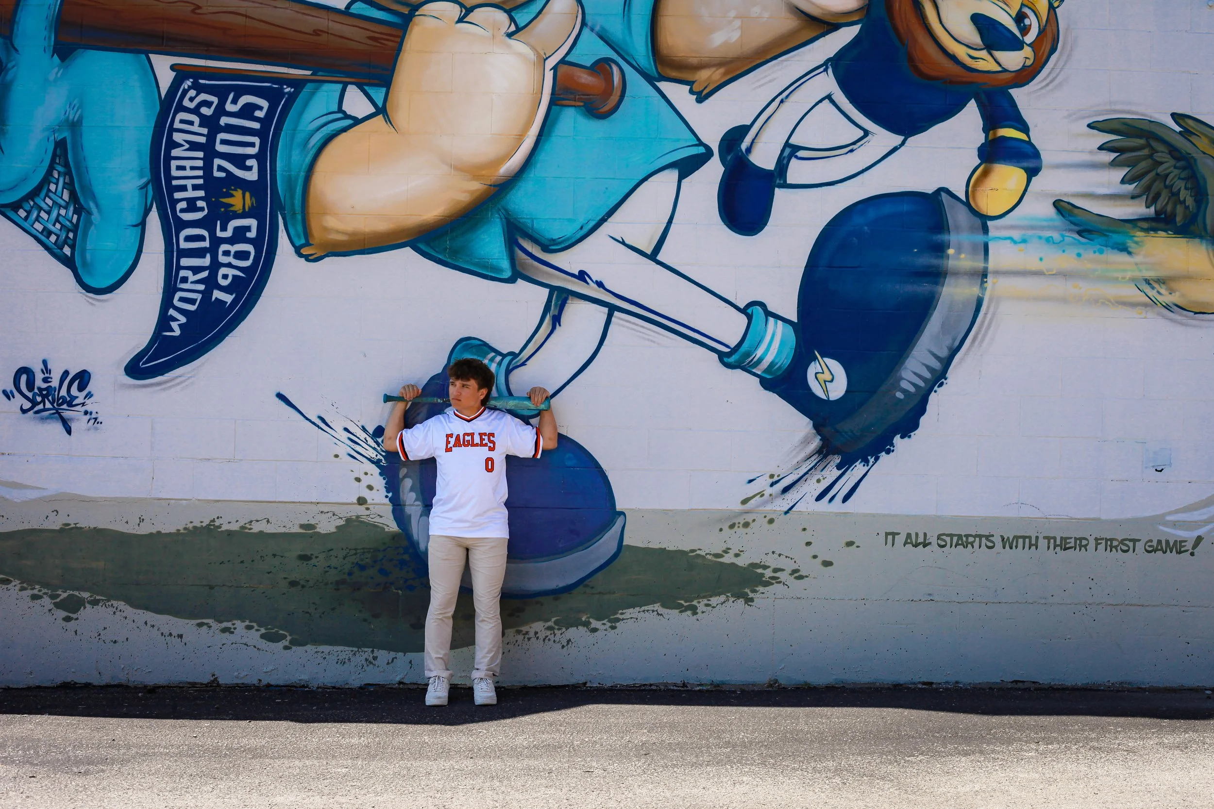 boy-senior-photo-kansas-city-mural-art-jersey-baseball-bat