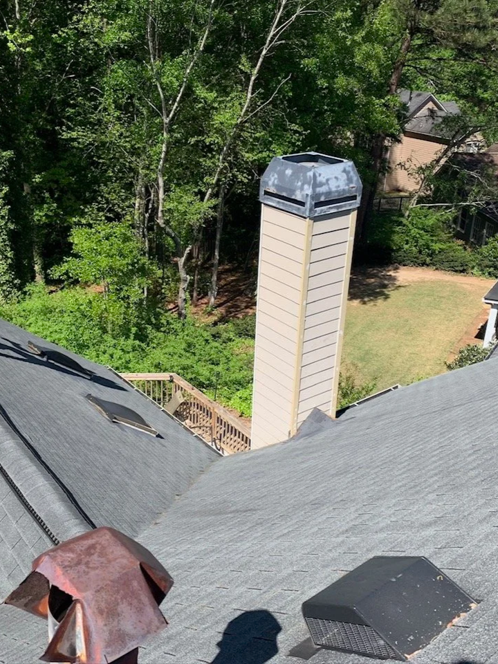 soft wash roof cleaning removing black streaks in Woodstock, Ga