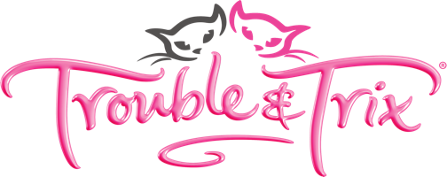 Colorful neon sign with pink and green accents that reads "trouble & next" in a stylized, cursive font.