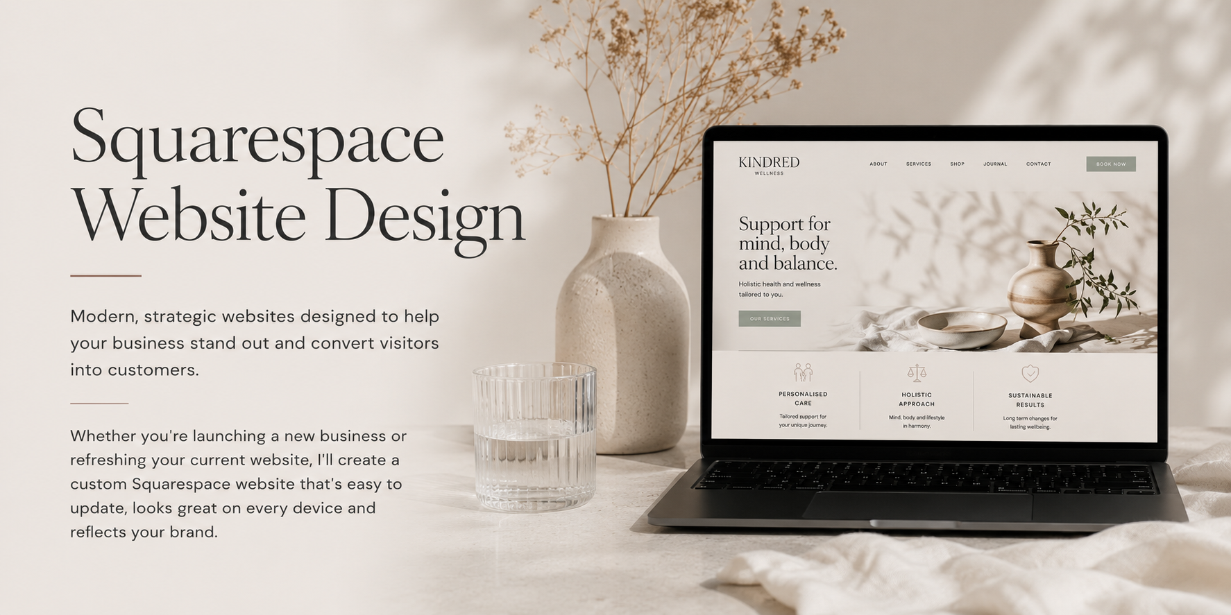 A webpage showcasing Squarespace website design services with a laptop, beige vase with dried branches, and a glass of water on a light-colored desk.