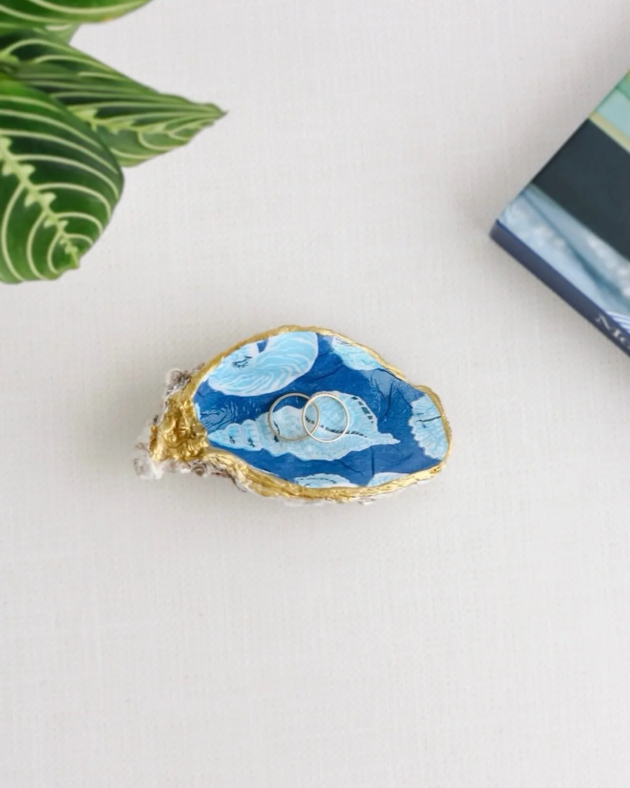 Blue seashells, golden edges, and tiny details that make everyday moments feel a little more special. This handcrafted oyster shell ring dish is now available on Etsy through Atelier Coquille 💙

#coastaldecor #handmadehome #ateliercoquille
