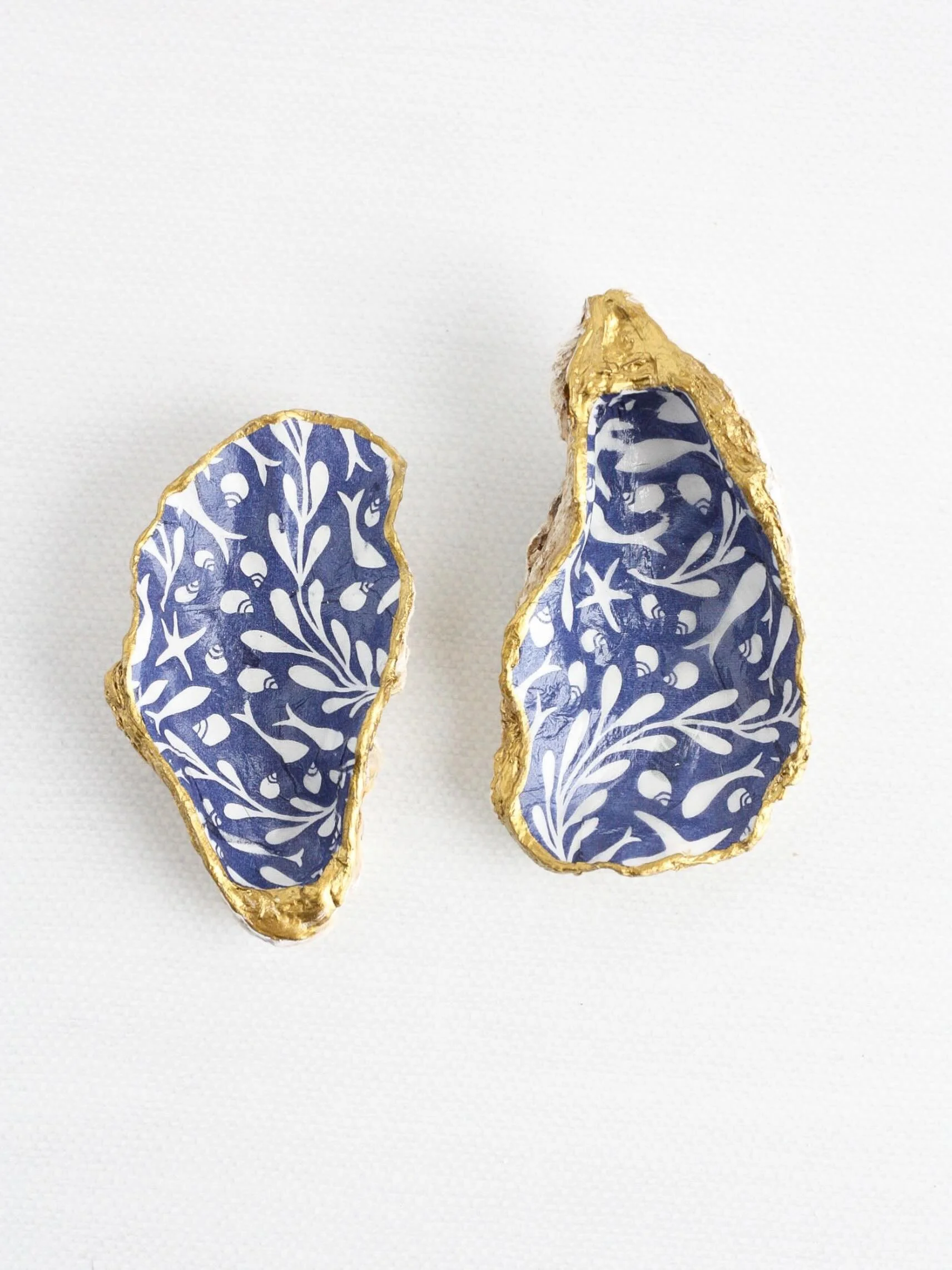 For the lovers of blue, gold, and the sea. 💙 Every piece is handcrafted from a real shell, making each one beautifully imperfect and completely unique.

Discover the collection through the links in our bio ✨

#ateliercoquille #coastalhomedecor #shel