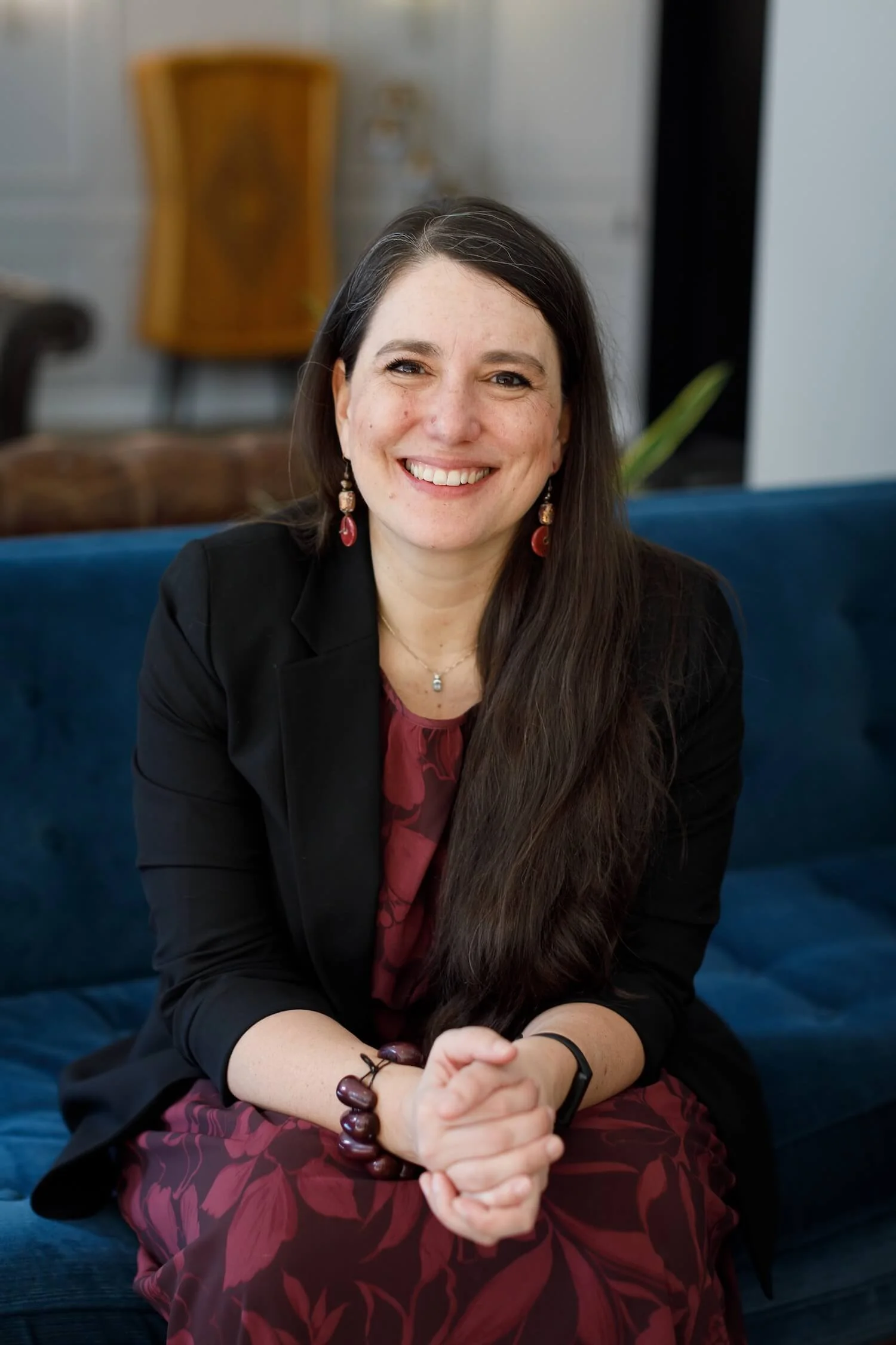 Clara Moisello, nonviolent communication trainer and neuroscientist, smiling in a professional portrait