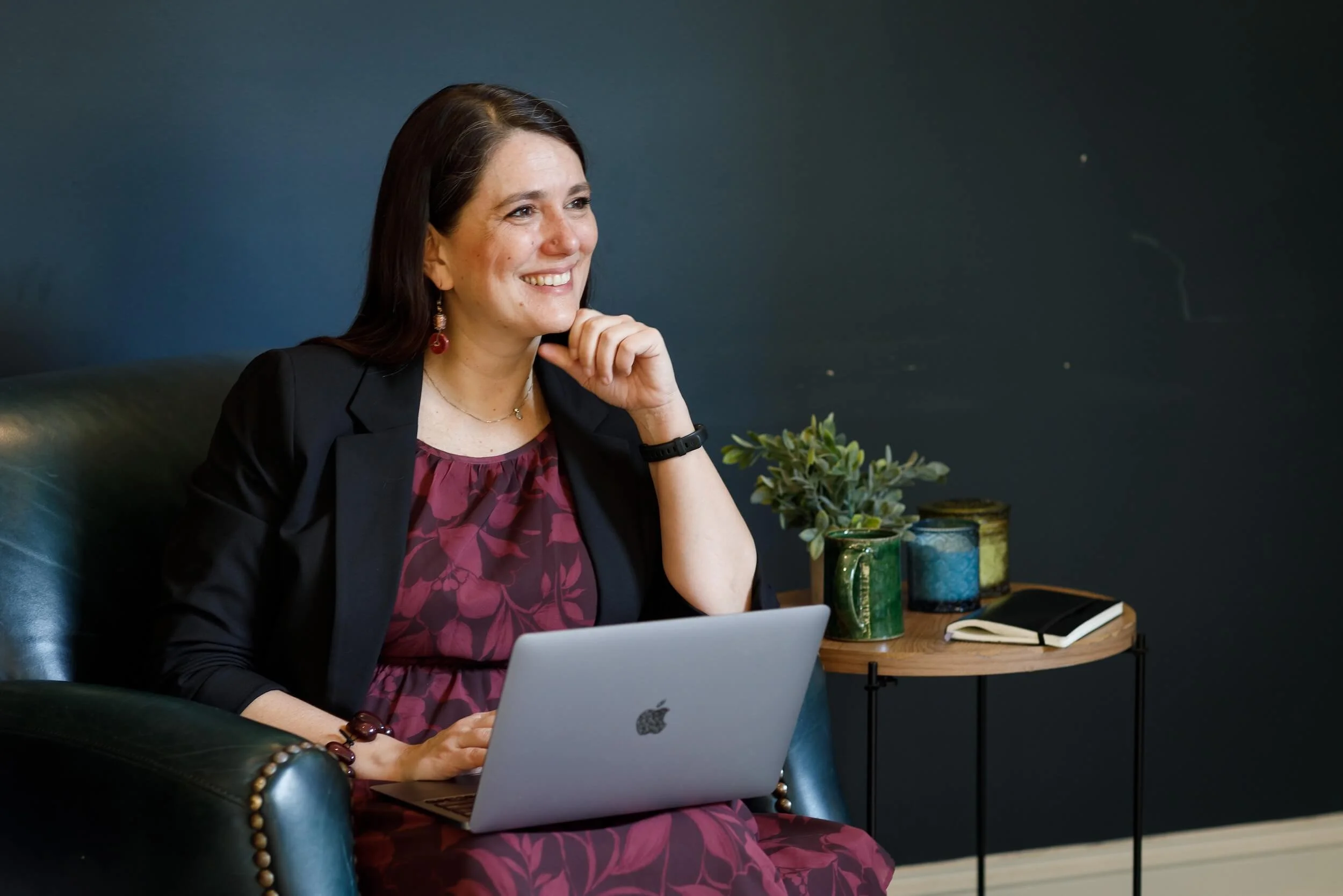 Clara Moisello smiling warmly, nonviolent communication trainer and neuroscientist